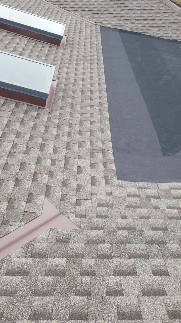 Skylight removal and install  by Absolute Roofing and Construction