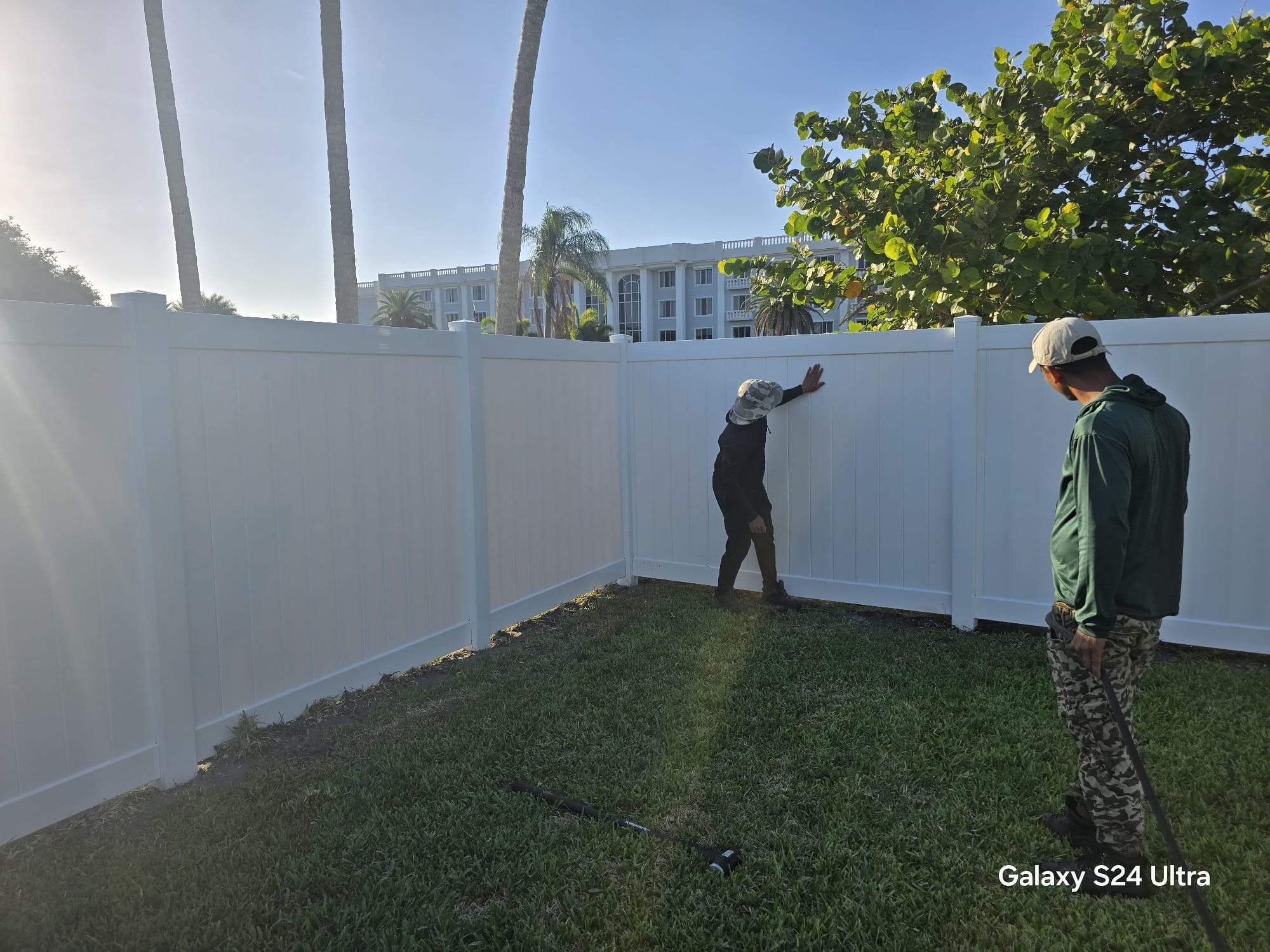 White Vinyl Privacy Fence and Double Gate Installation in Fort Myers by True Fence LLC