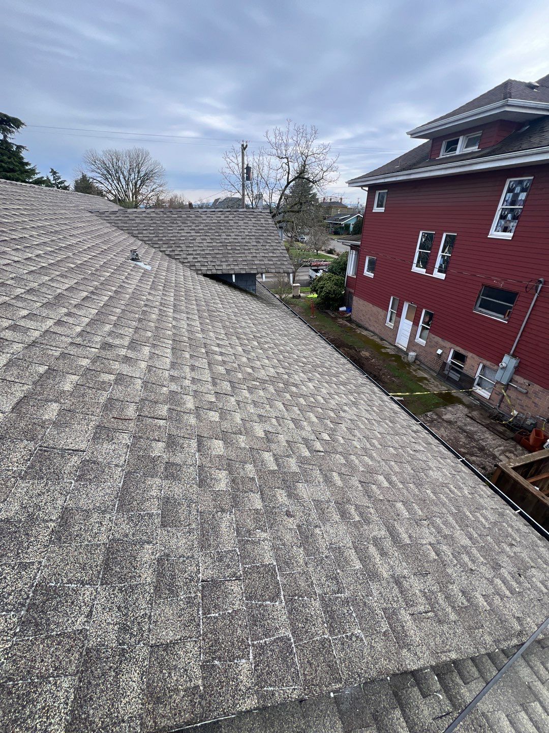 Residential Roofing Installation using IKO Dynasty (Color: Summit Grey) by Orezona Building & Roofing Company, Inc.