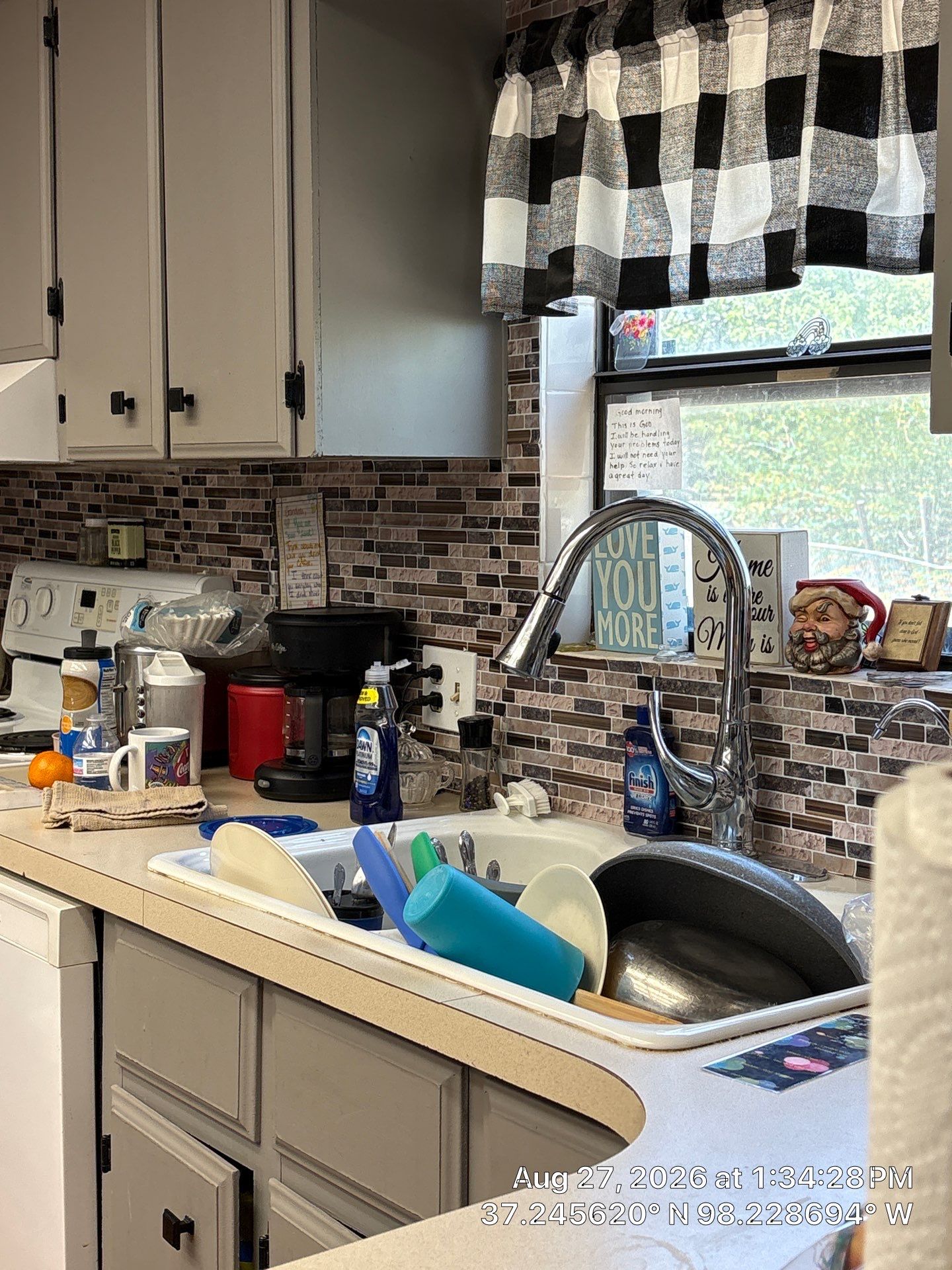 Attica Kitchen Remodel With Grey Cabinets and Mosaic Backsplash by CompanyCam Sales Demo