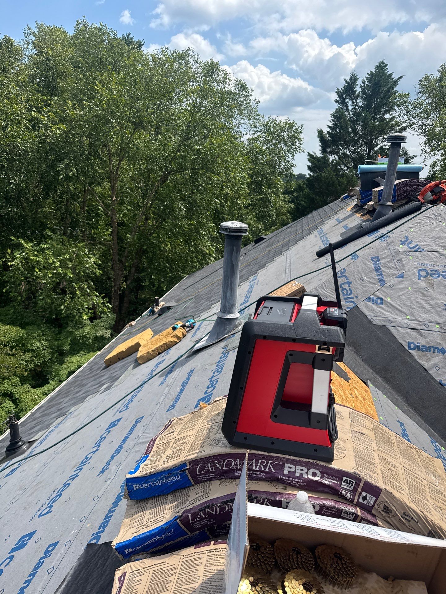 New Shingle Roof & New Gutters and downspouts with covers by Alpha Design Services