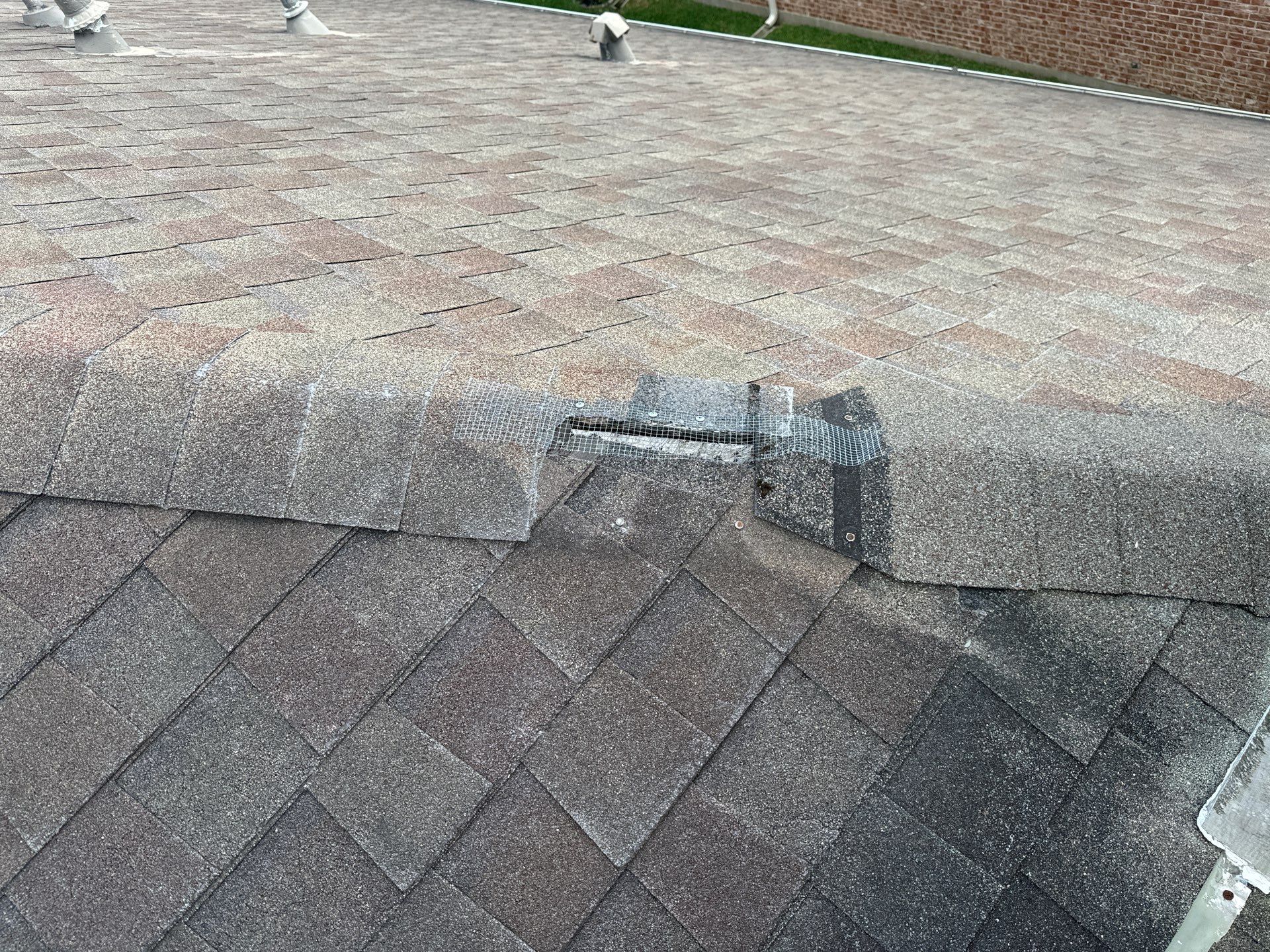 Hail Damage using Owen's Corning Duration (Lifetime) Shingles by Roof Repair Company