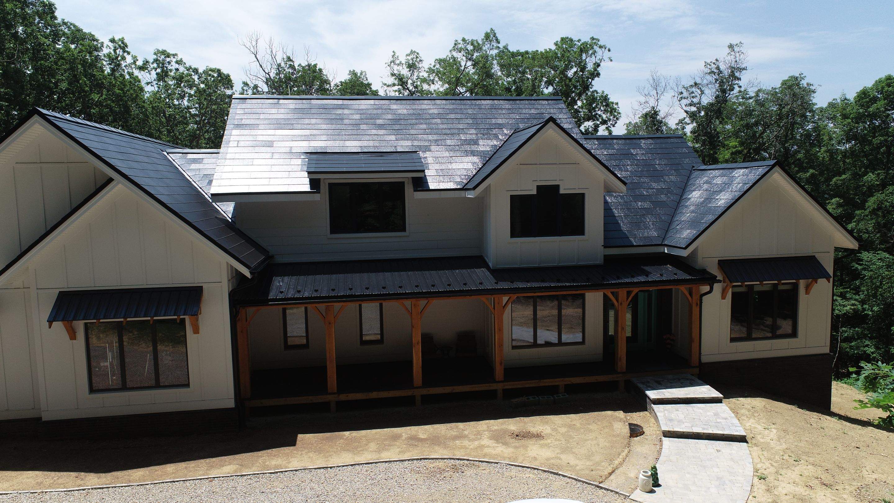 New Construction with Tesla Solar Roof + Powerwall by American Home Contractors