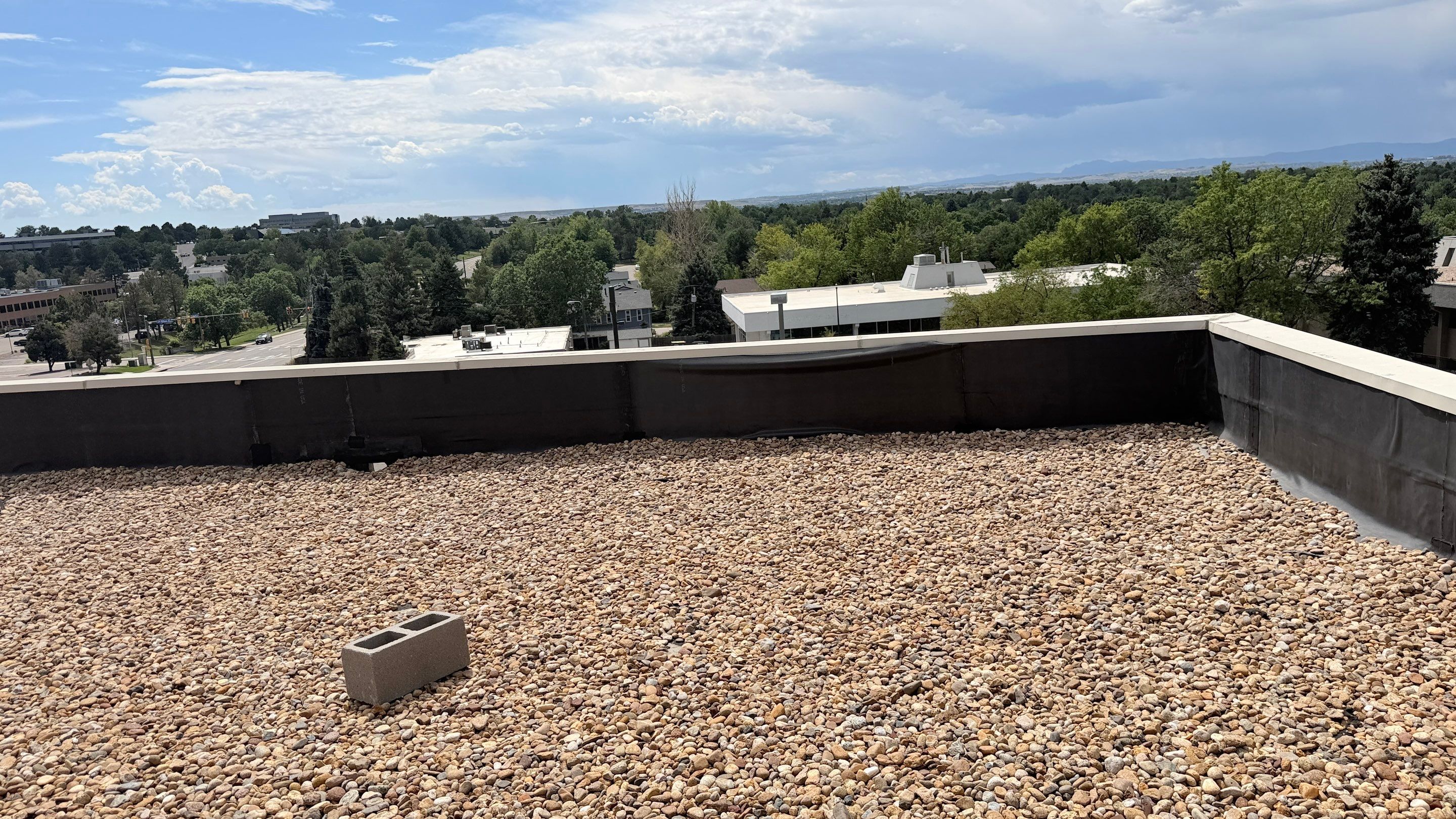 EPDM Commercial Roof Repair and Ballast Maintenance in Centennial by Rhino Roofing LLC