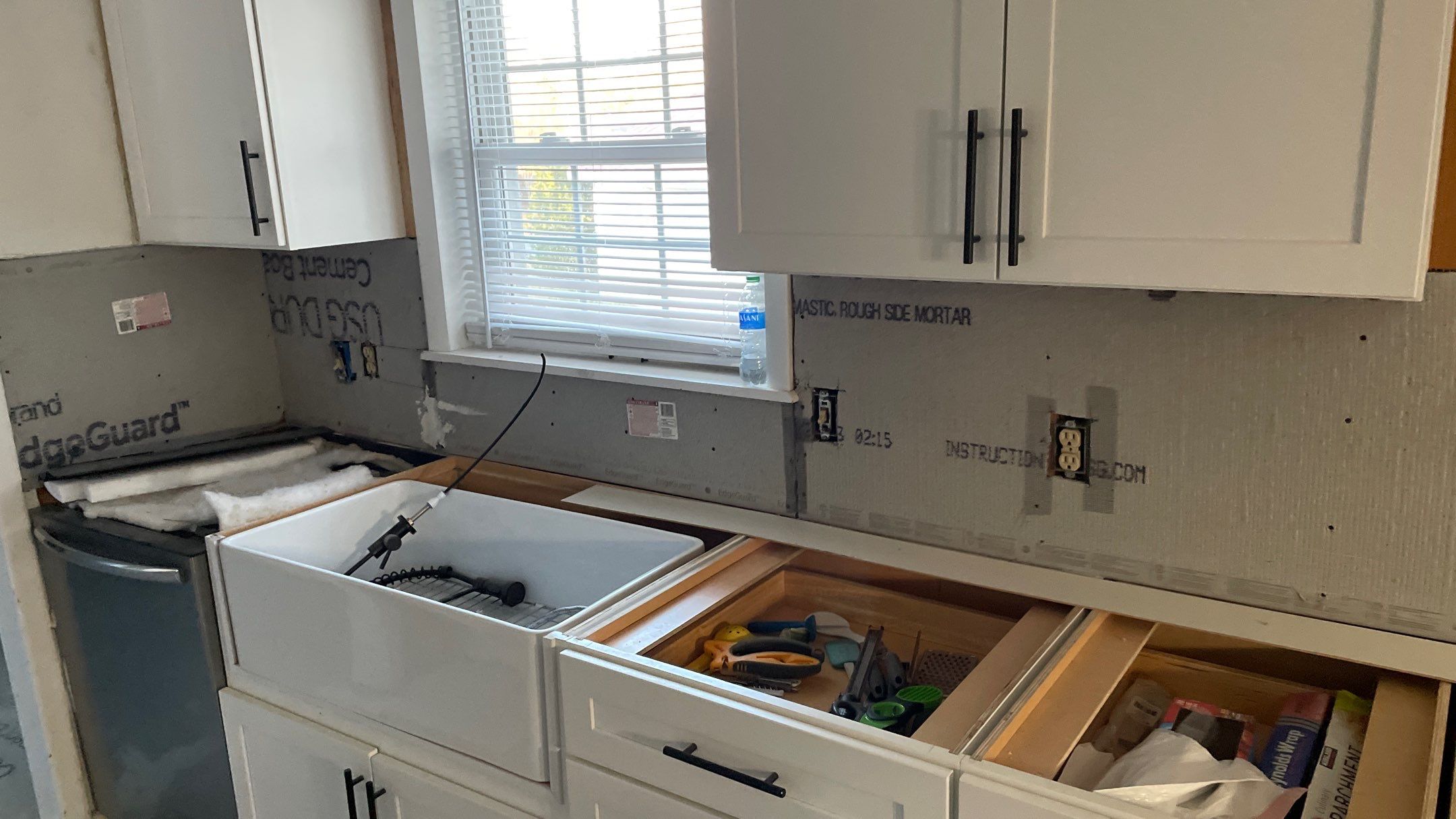 Kitchen Backsplash and Herringbone Tile Floor Remodel by Footprints Floors of Coastal Carolina