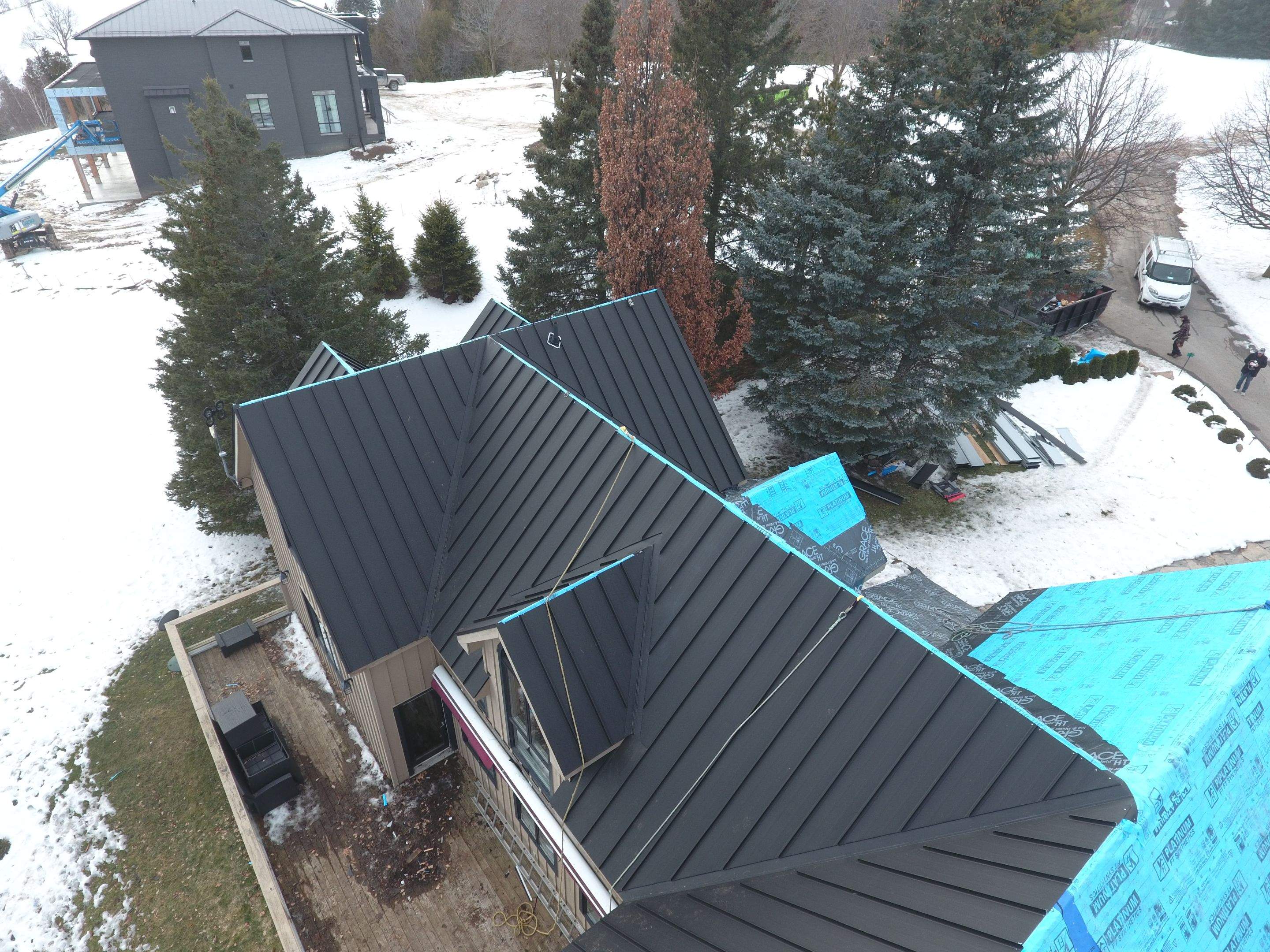 Residential Roofing Installation using 24 Ga Standing Seam Metal by Jay Carter Roofing & Sheet Metal