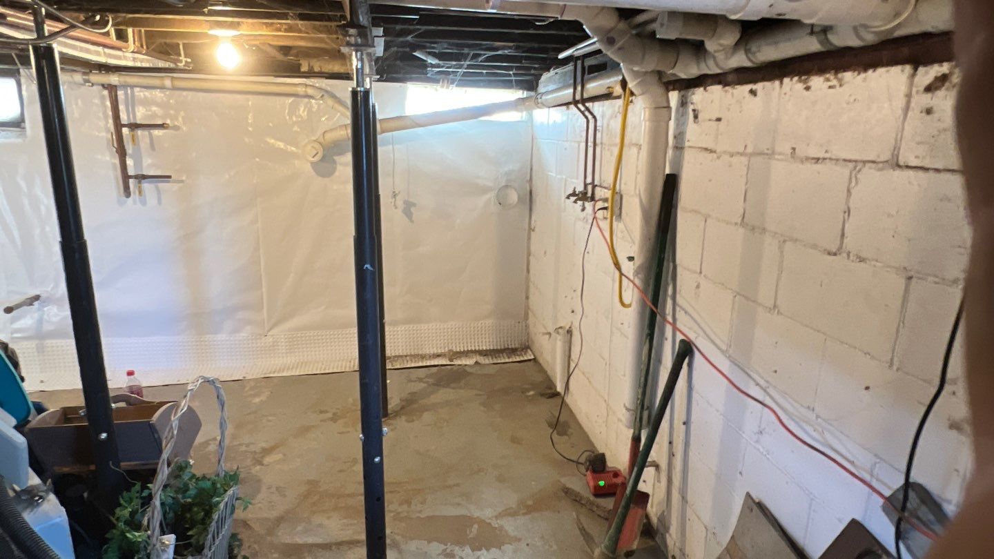 Basement Waterproofing using Drain tile system and a foundation wrap by ACE Waterproofing & Basement Solutions