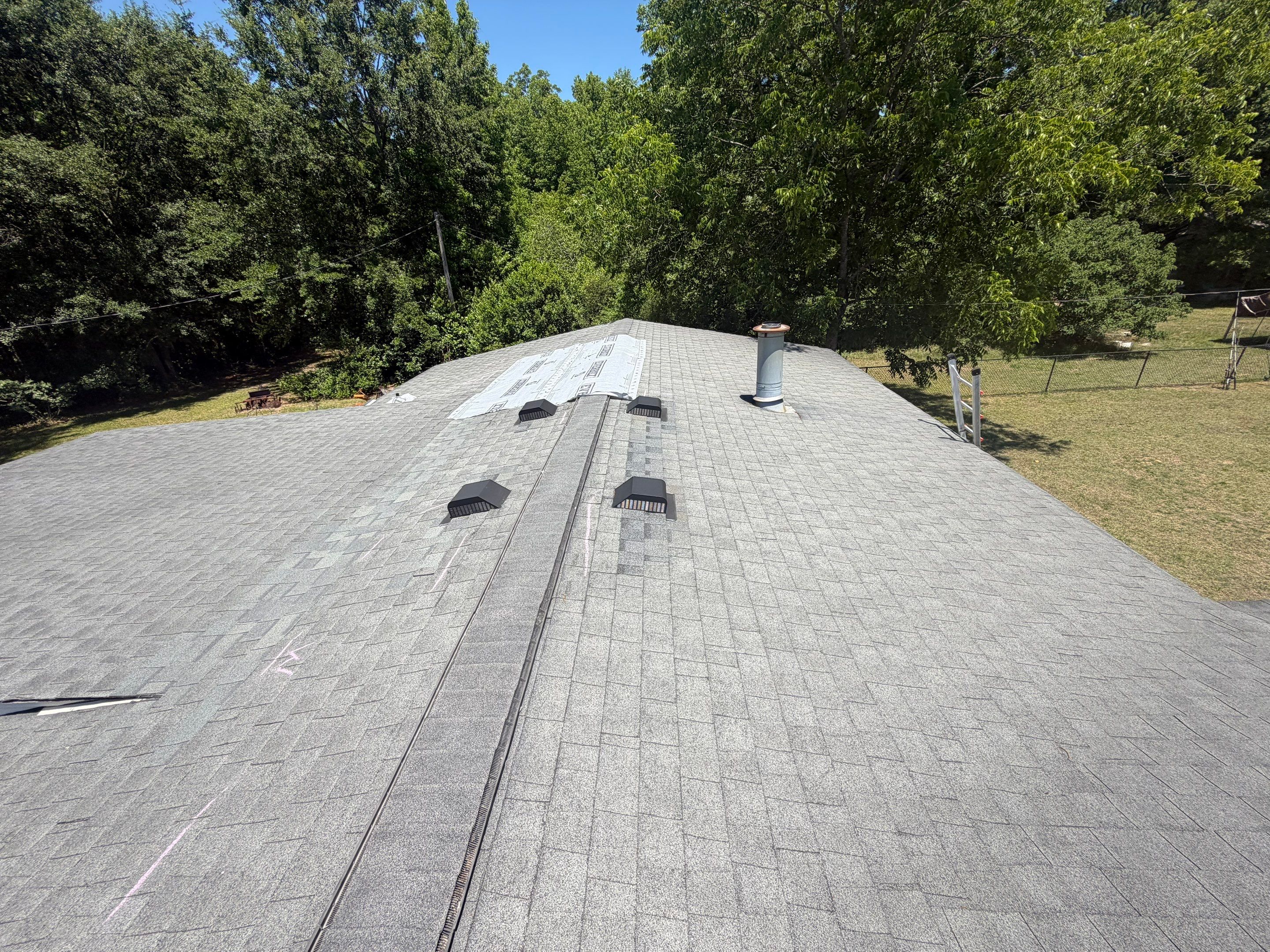 Standing Seam Green Metal Roof Installation in Sumter by Exterior Genie, LLC