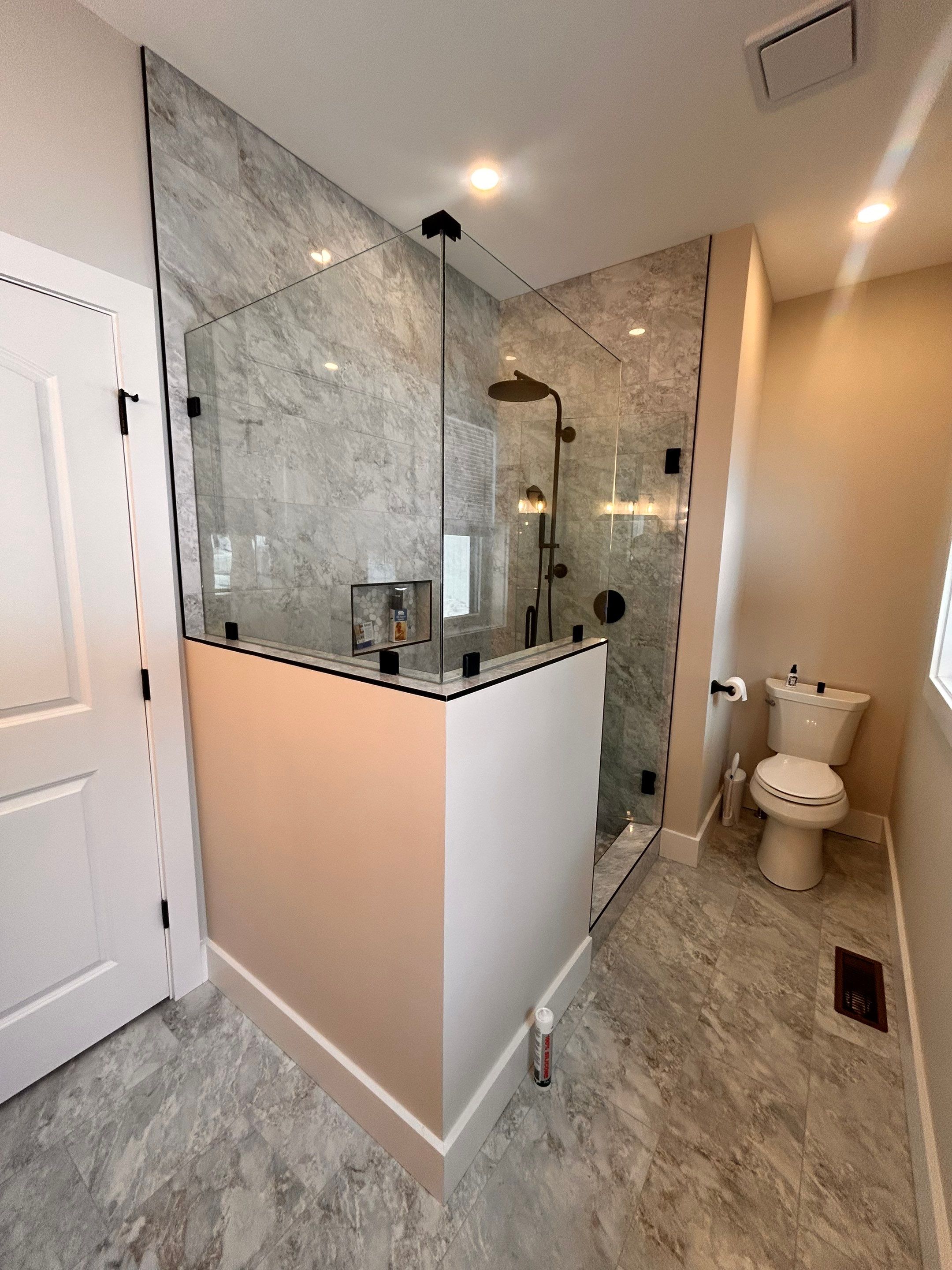 Frameless Shower Enclosure using Tempered Shower Glass by Cheshire Glass Company