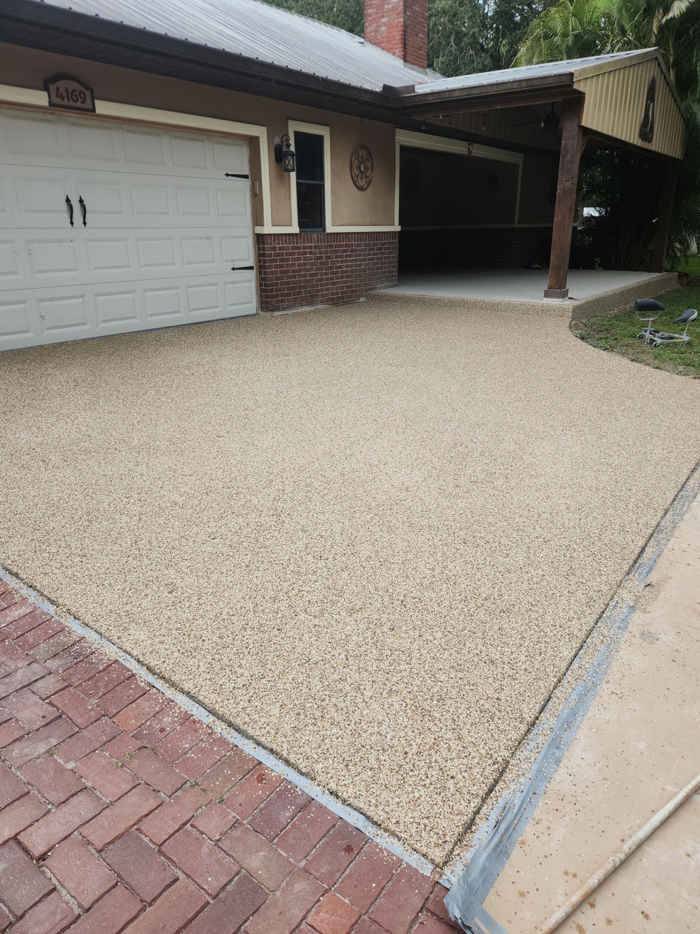 Driveway & Patio Recoating using Polyaspartic by Revelry Coatings