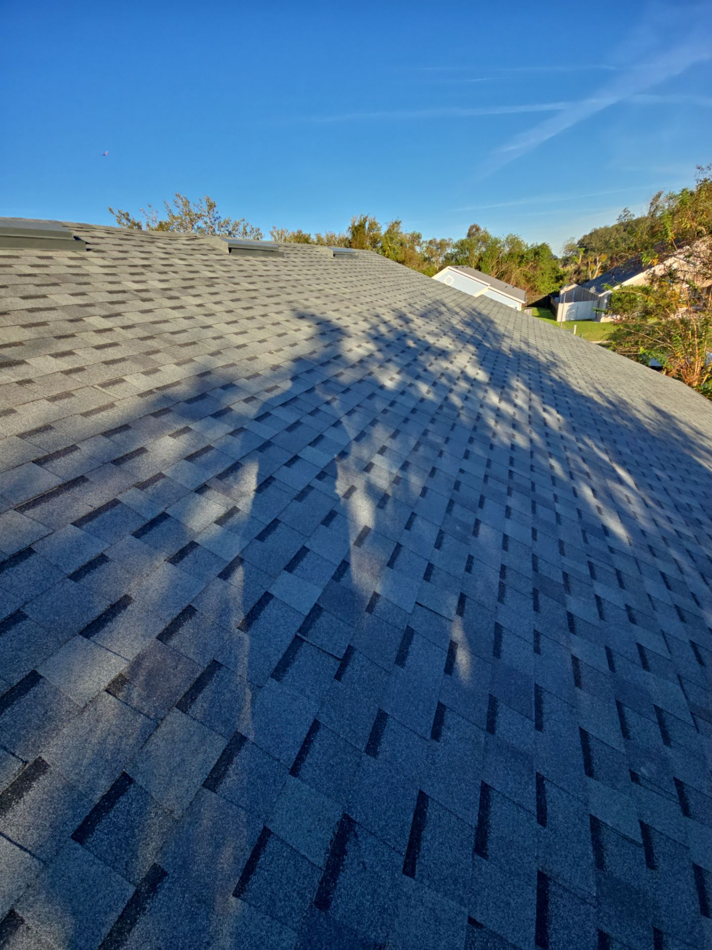 Atlas Pinnacle Pristine Architectural Shingle Roof Replacement in Kissimmee by Fortified Roofing Solutions Corp.