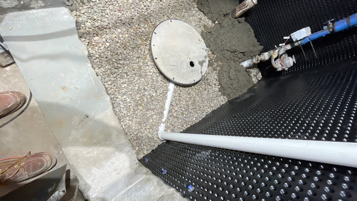 Interior Drain Tile & Sump Pump System in West Minneapolis by Waterproofing Northeast