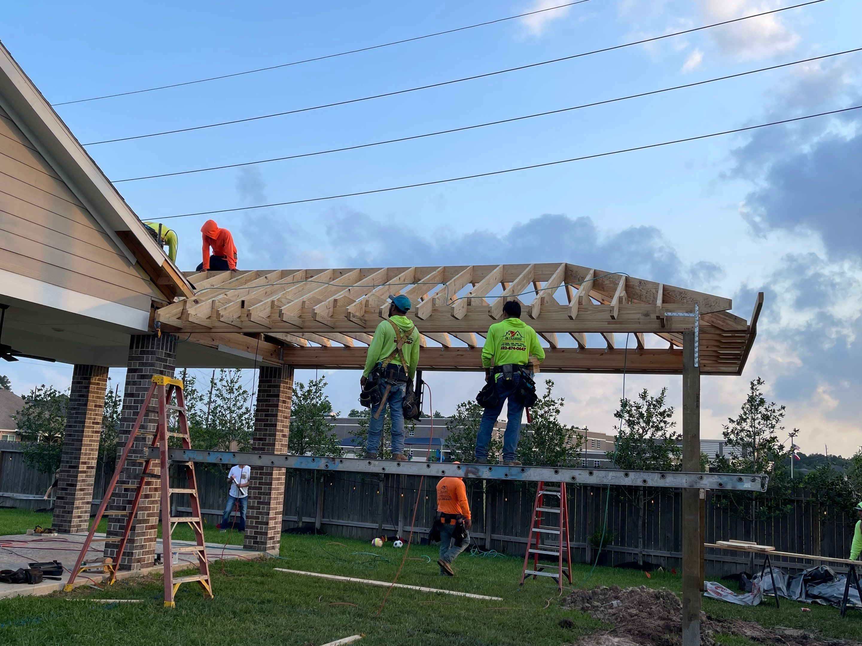 Covered patio and Summer Kitchen in Spring, TX by SophAlx LLC