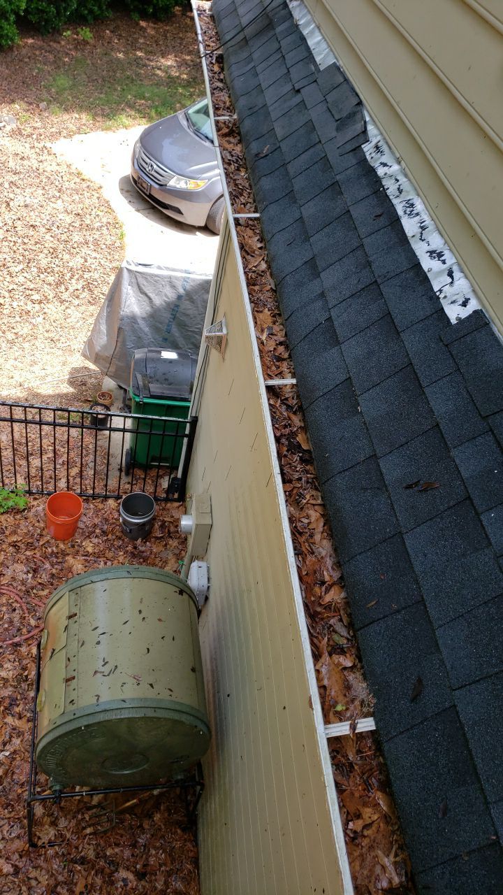 Gutter Cleaning using water by Power Wash Masters LLC