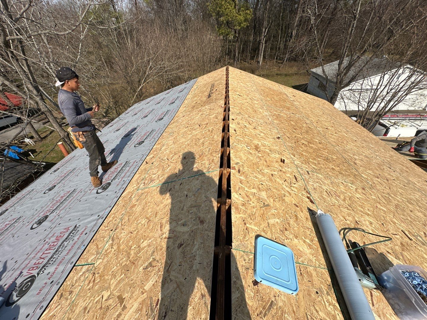 Residential Roofing Installation using Standing Seam Metal by Undersun Roofing 
