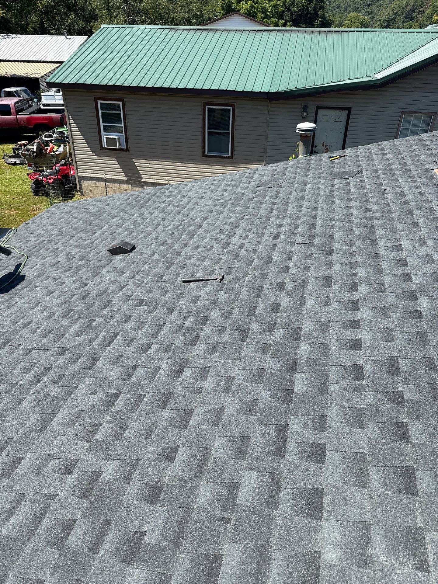 Residential Roofing Installation using GAF Timberline HDZ Charcoal by Rainstoppers Roofing