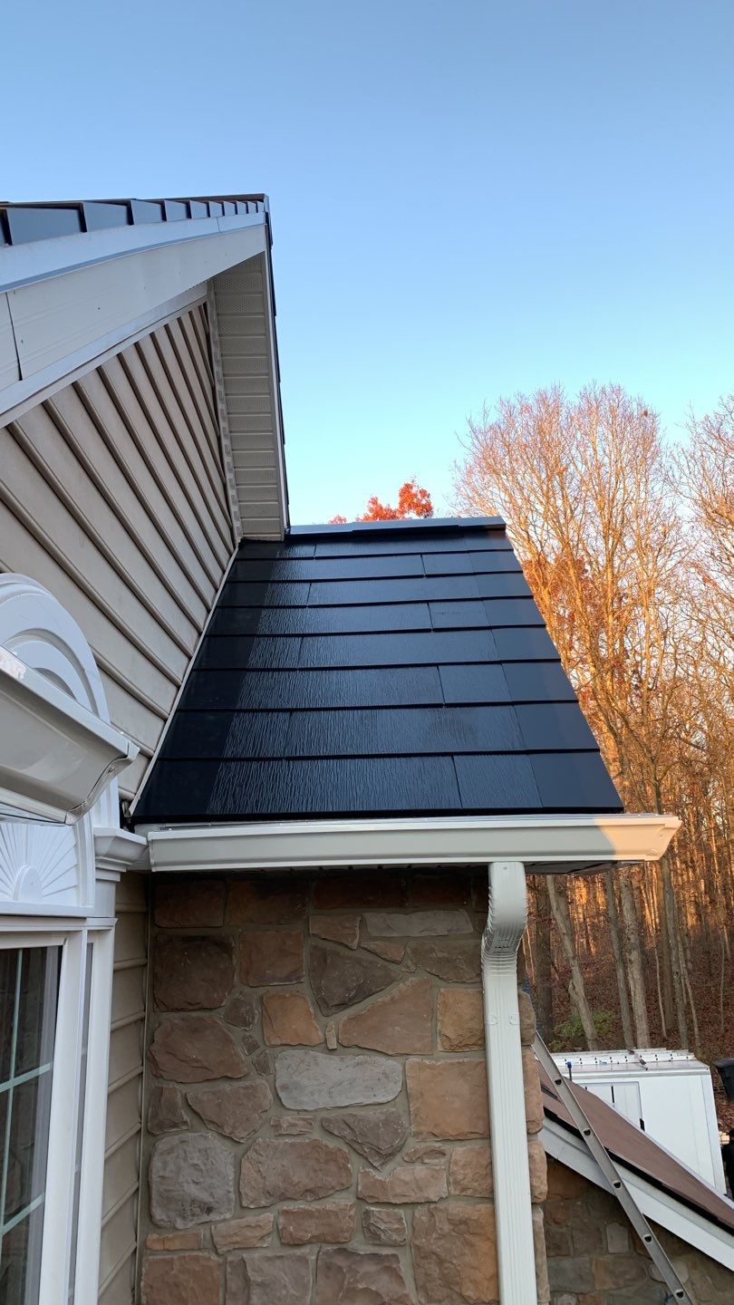 Tesla Solar Roof Replacement by American Home Contractors