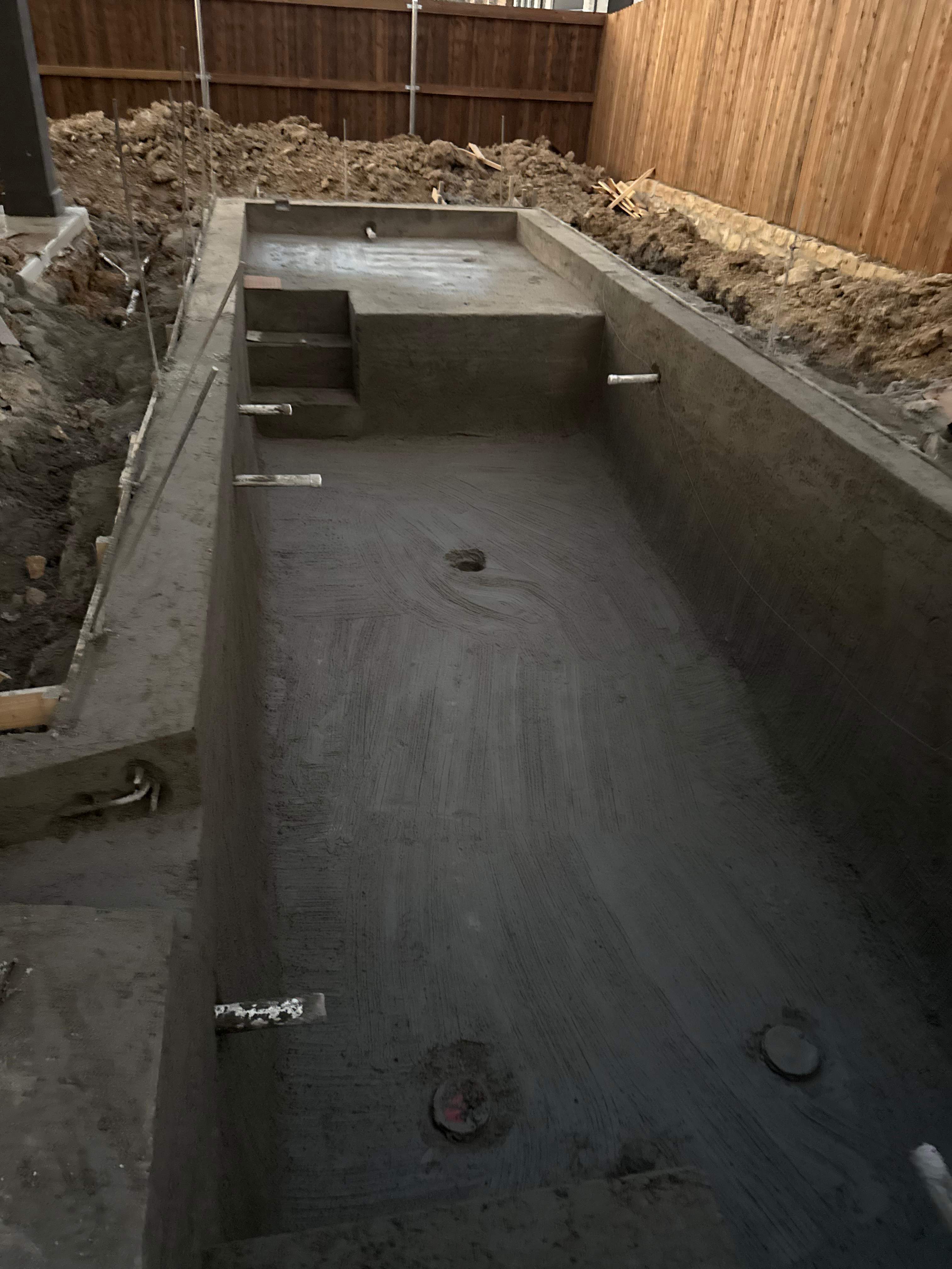 Geometric Pool with Raised Spa and Sheer Descent Waterfall by Pinnacle Pools and Spas - DFW
