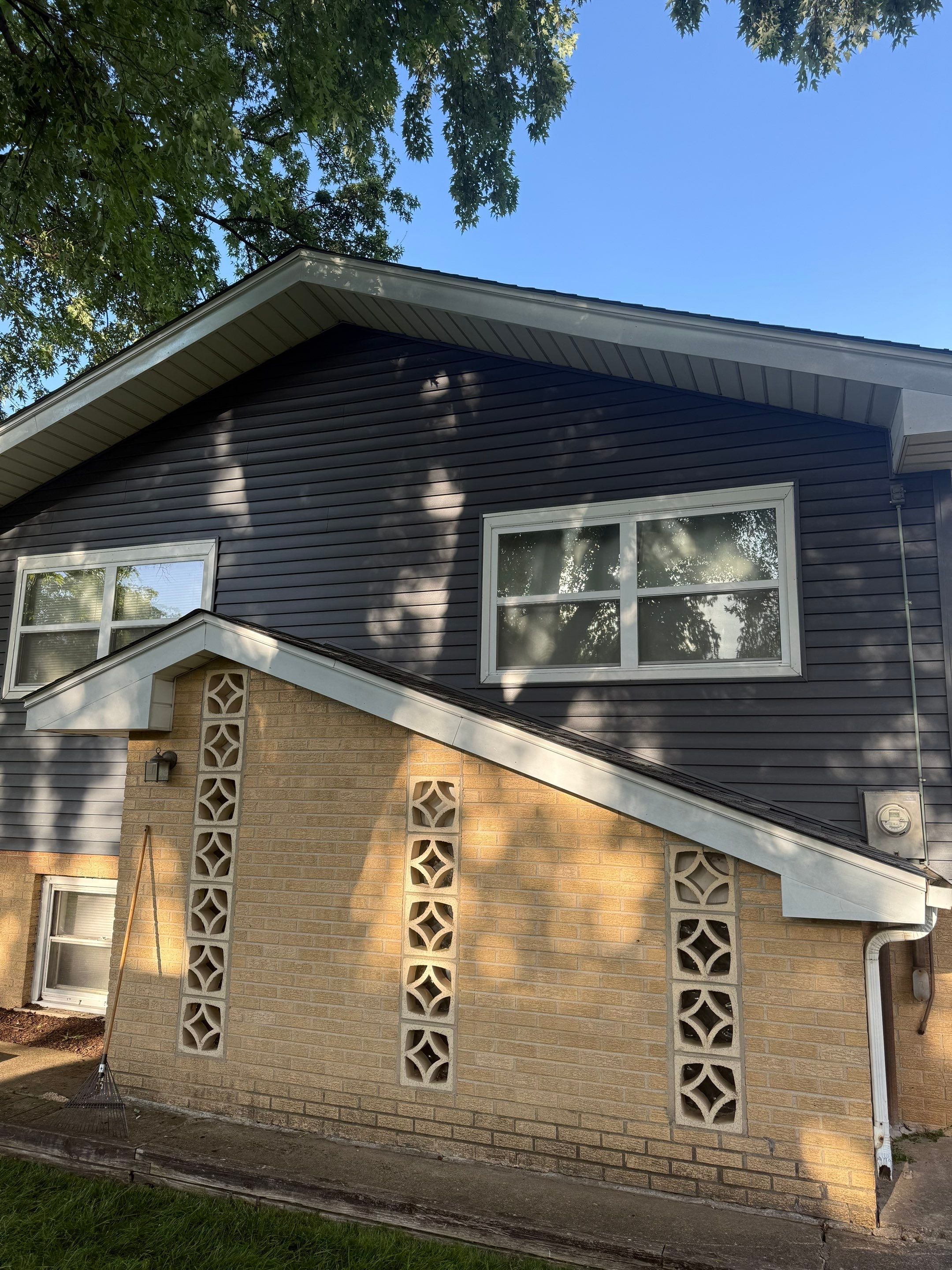 Roof replacement and chimney flashing by Optimal Home Improvement 