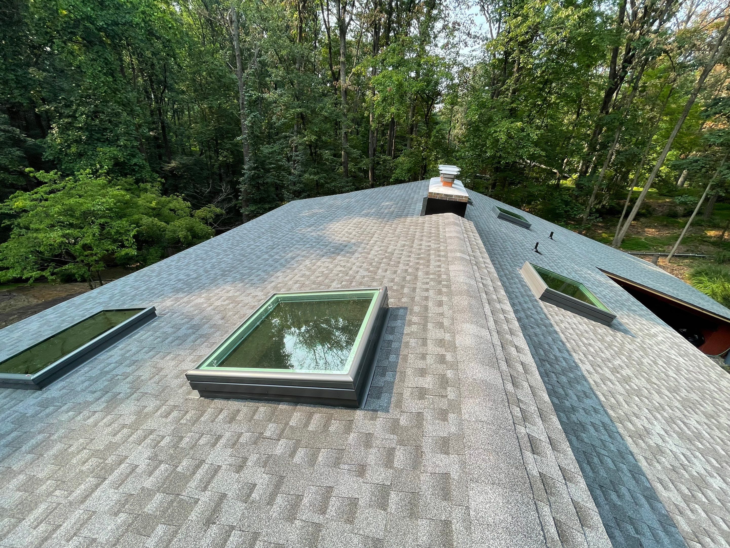 Deckhouse Roof Replacement by American Home Contractors