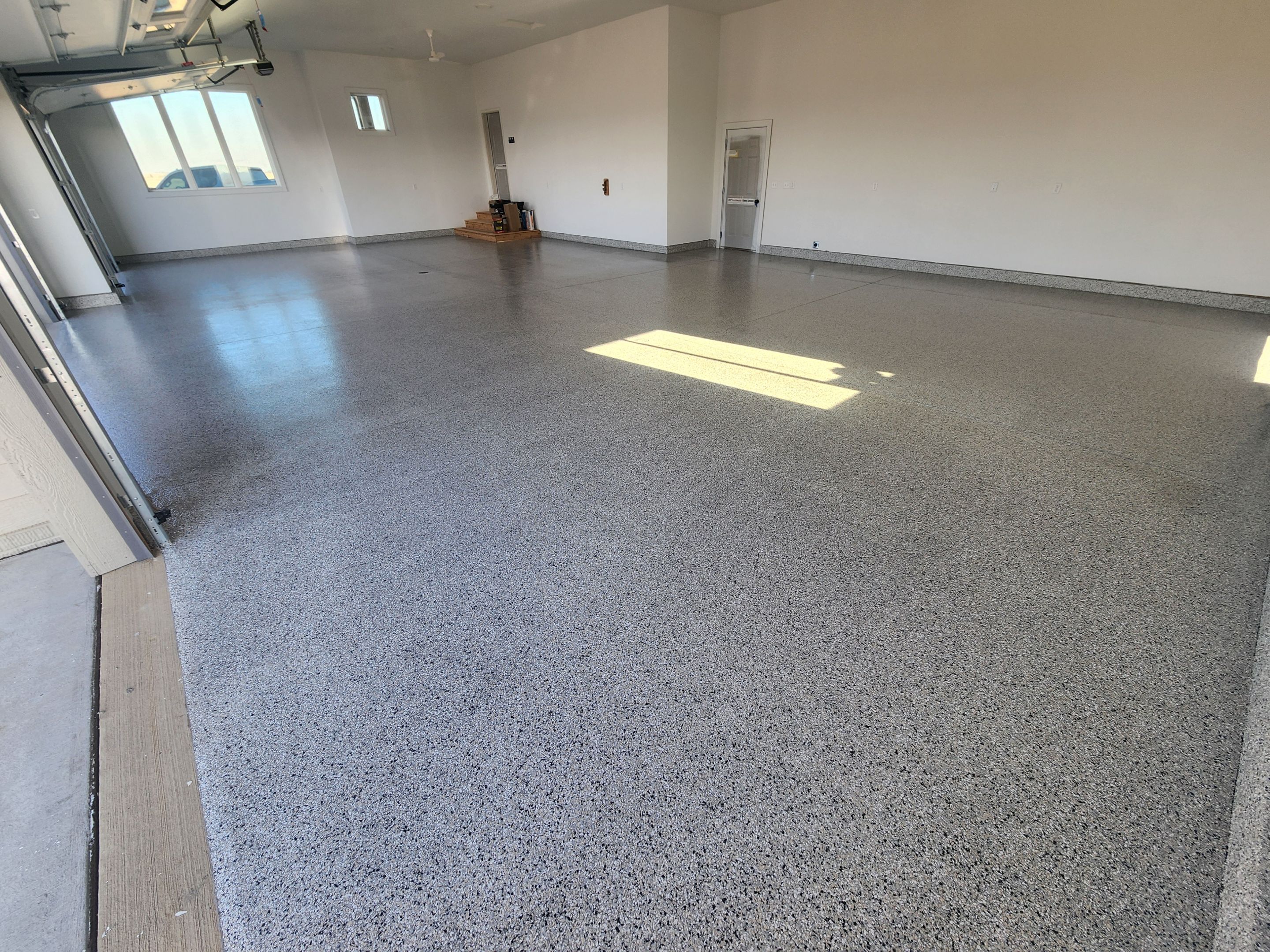 Garage using Domino by Select Painting, Coatings & Garage Cabinets
