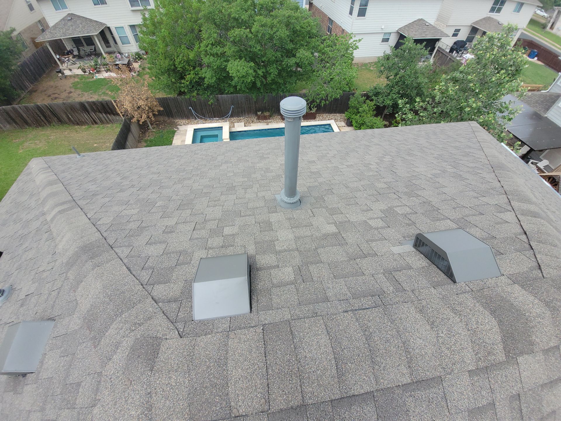 Residential Roofing Installation using IKO, Cambridge and gutters by Oakwood Roofing and Construction, LLC