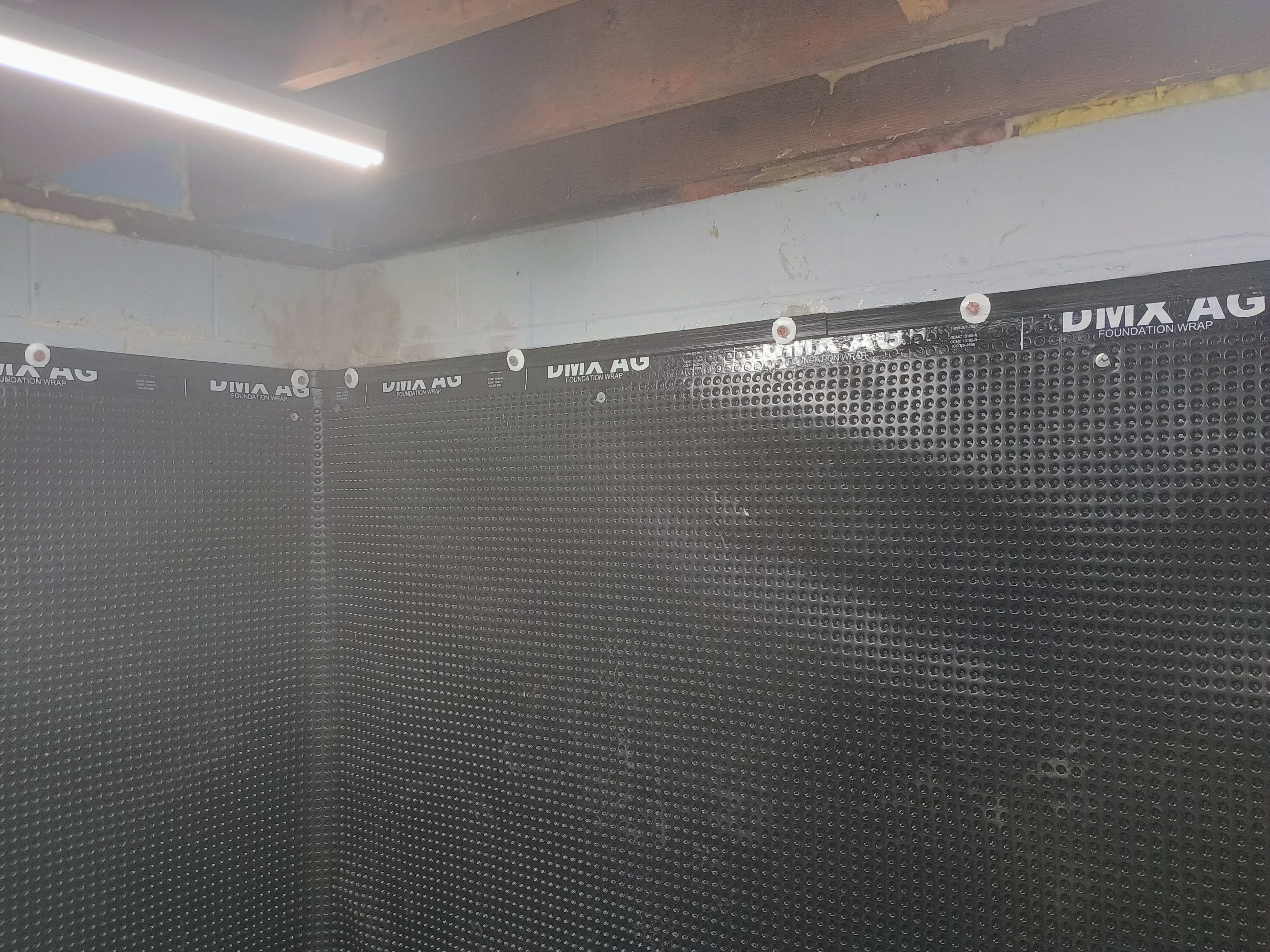 Depressurizing Denny's Basement Wall by Waterproofing Northeast