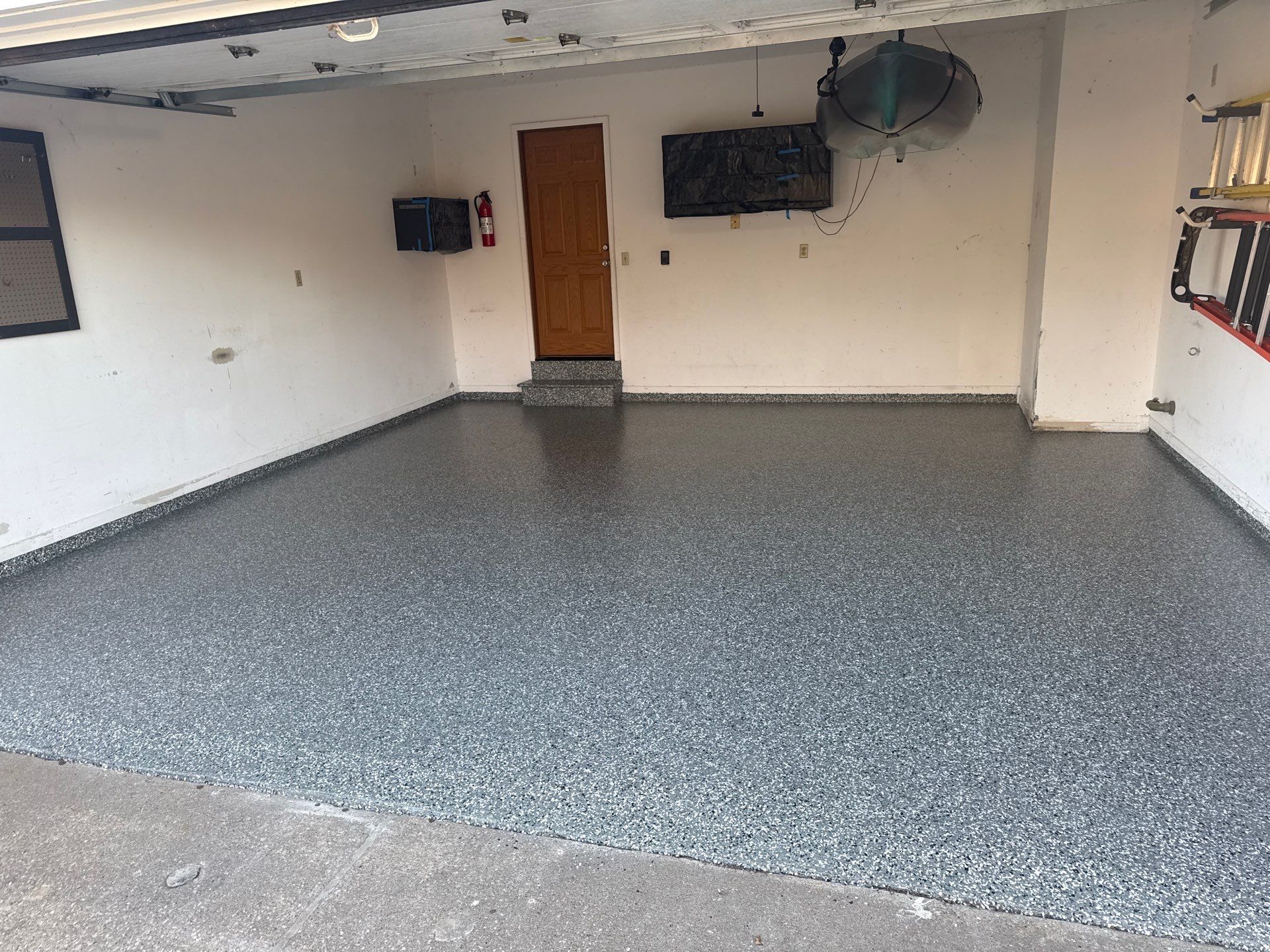 38 Year Old Garage Looking Brand New! by Revival Concrete Coatings, LLC