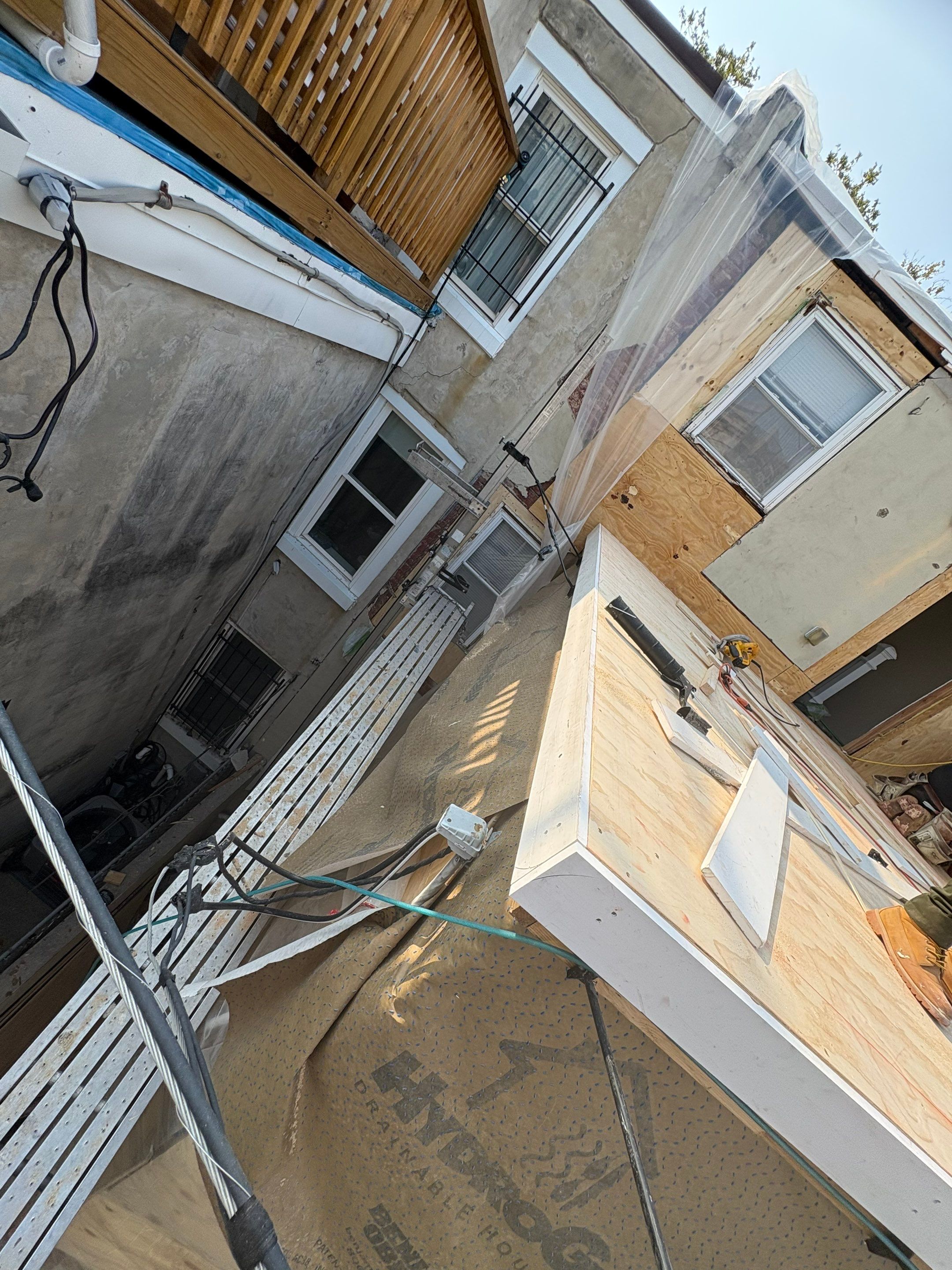 Back Wall & Fiberglass Roof deck Remediation by Philadelphia Quality Roofing