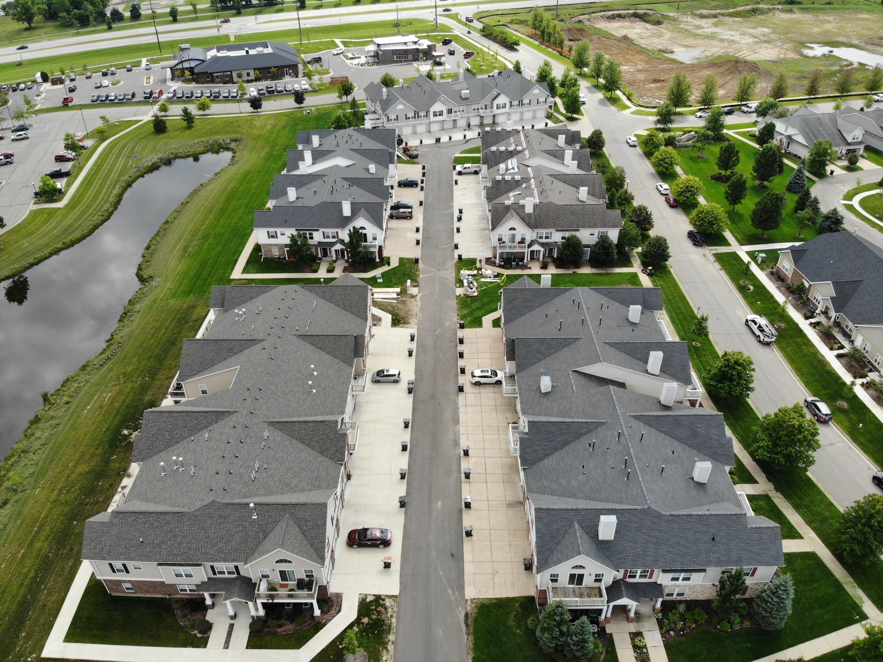 Multi Family Large Scale Roof Replacement by Bloomfield Construction & Restoration