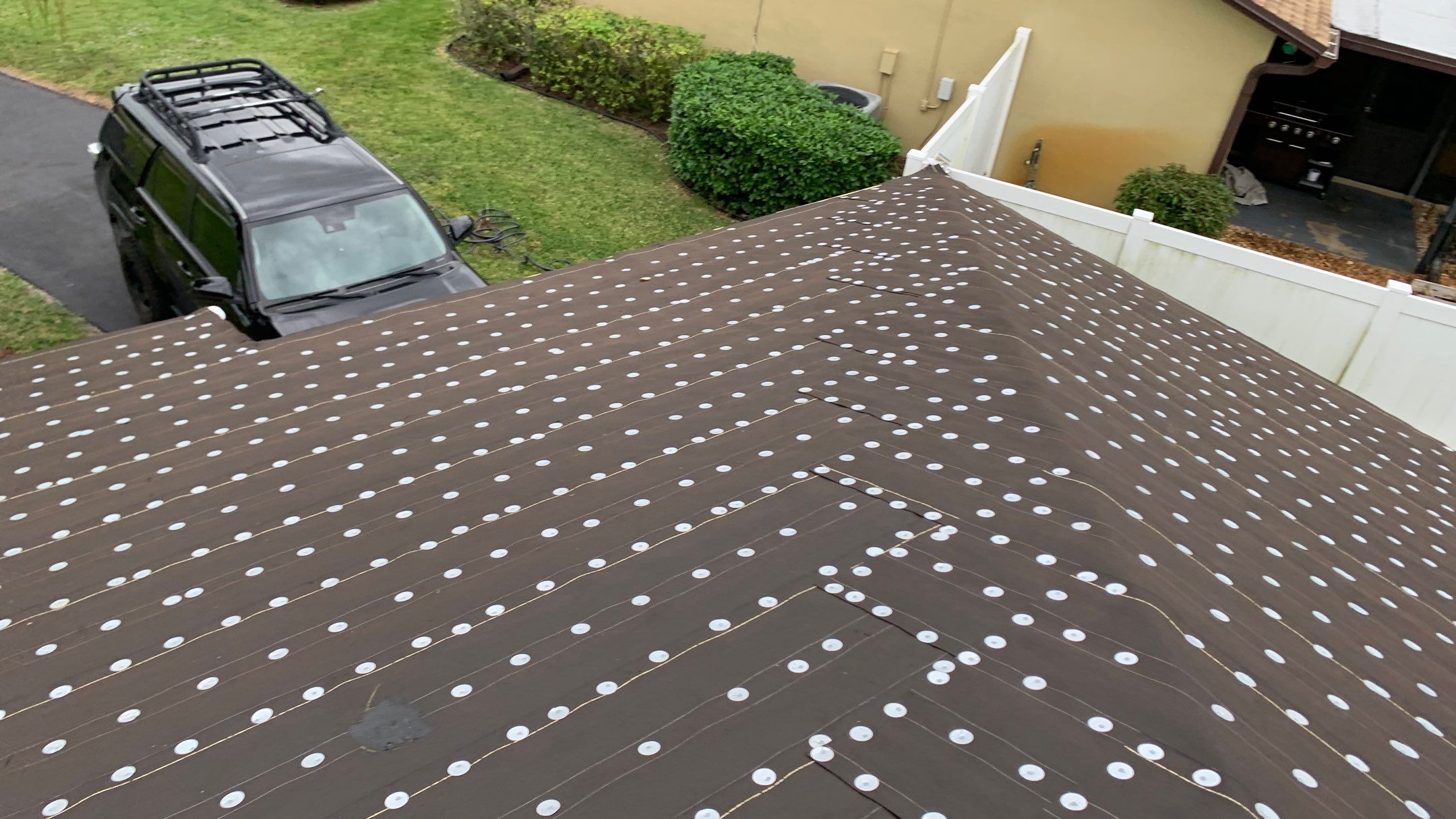 Residential Roofing Installation using 1" Nail strip metal roof by BLUES BROTHERS ROOFING