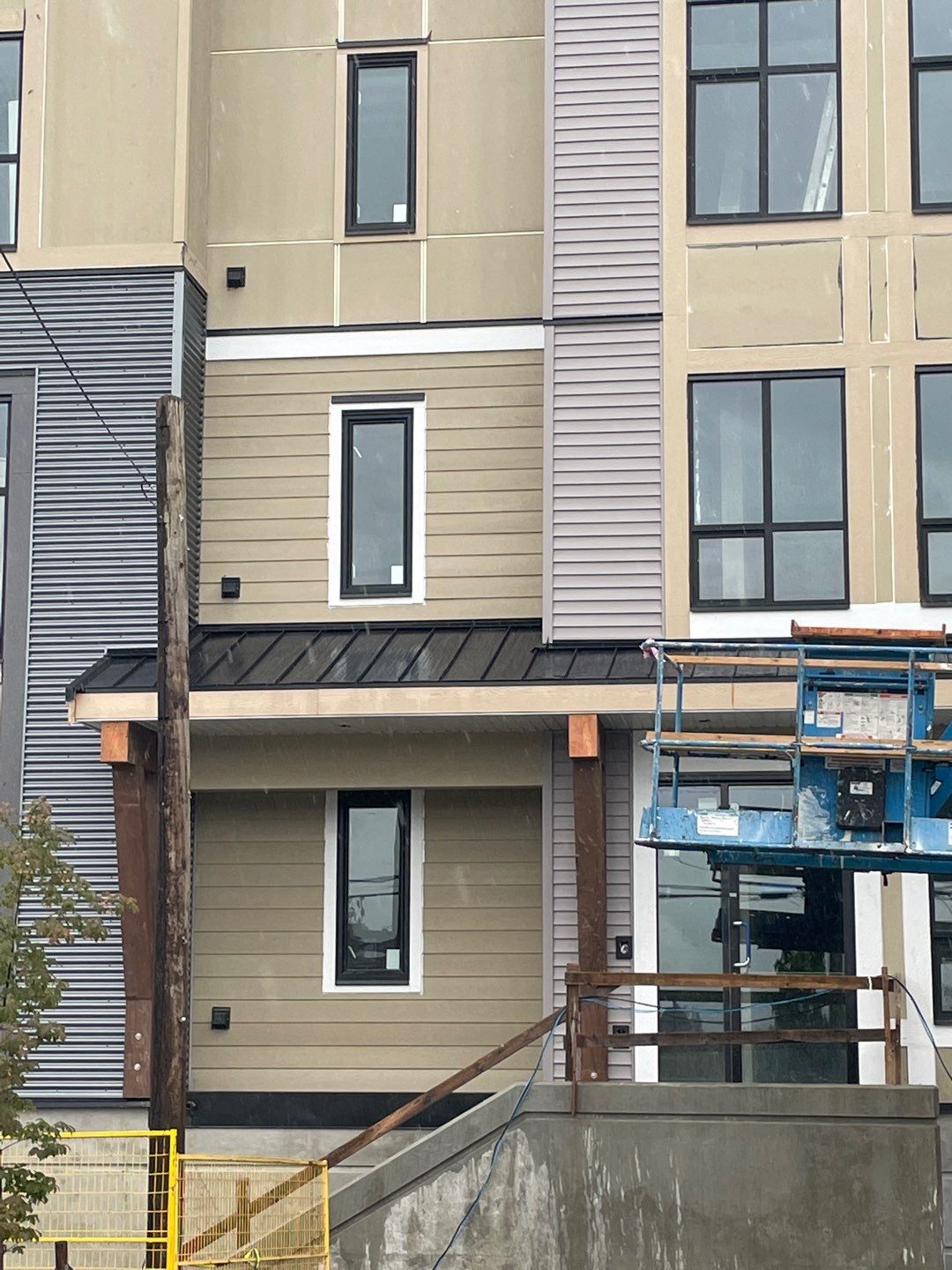 Large apartment with sbs, shingles and prolok metal  by Top Notch Roofing Inc