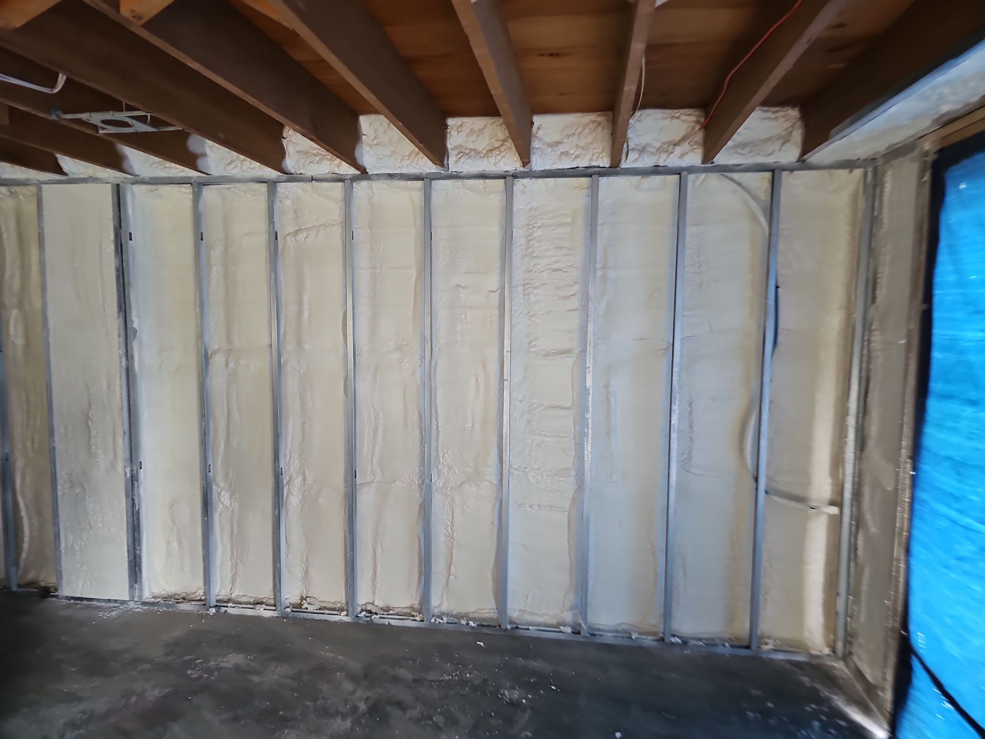 Basement Exterior Walls using Closed Cell Spray Foam by NYS Foam & Energy