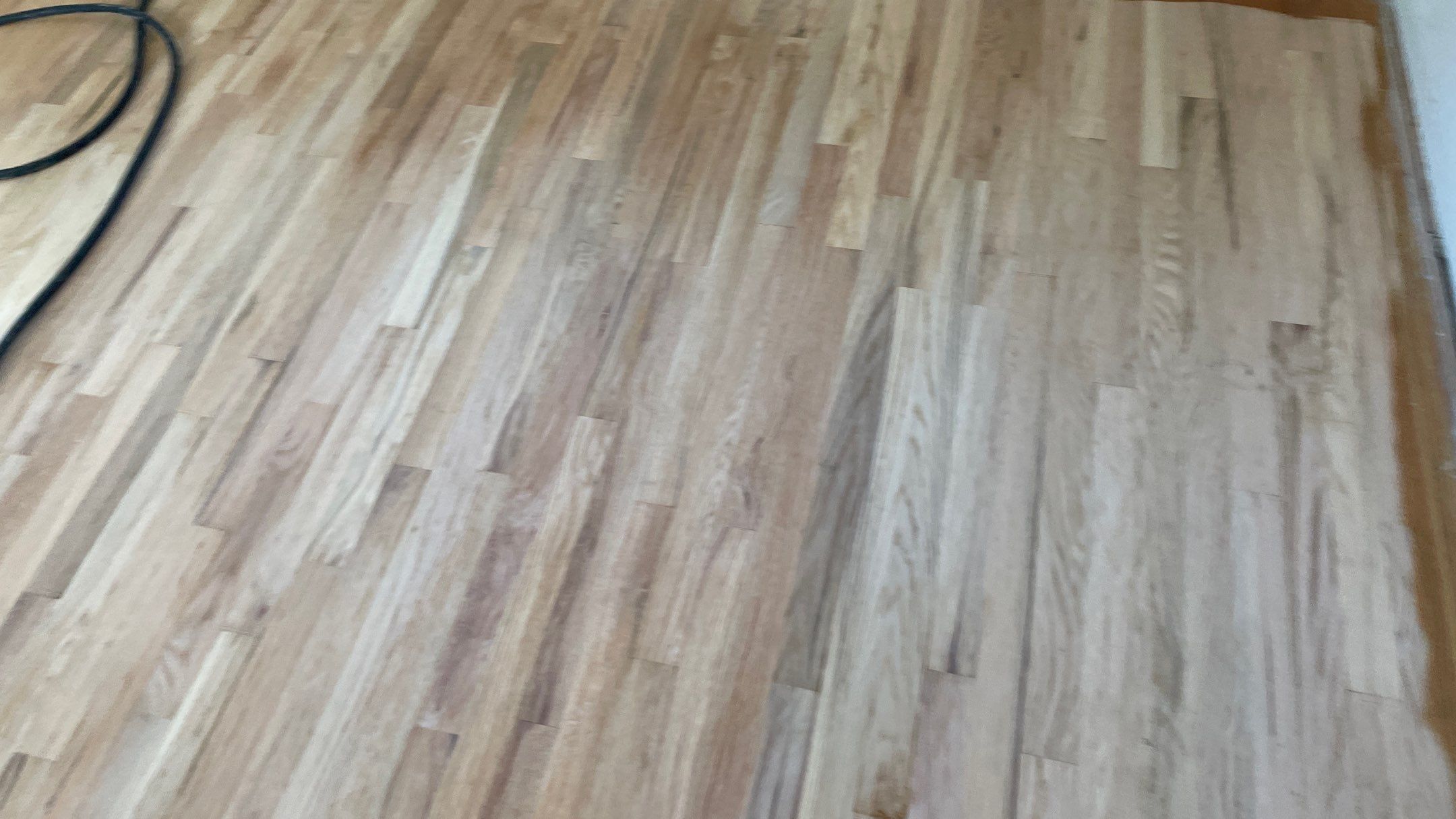 Remodeled Home with new tile floors, Showers and Refinished Oak Floors with stain and Waterbased Finish by Footprints Floors of Coastal Carolina