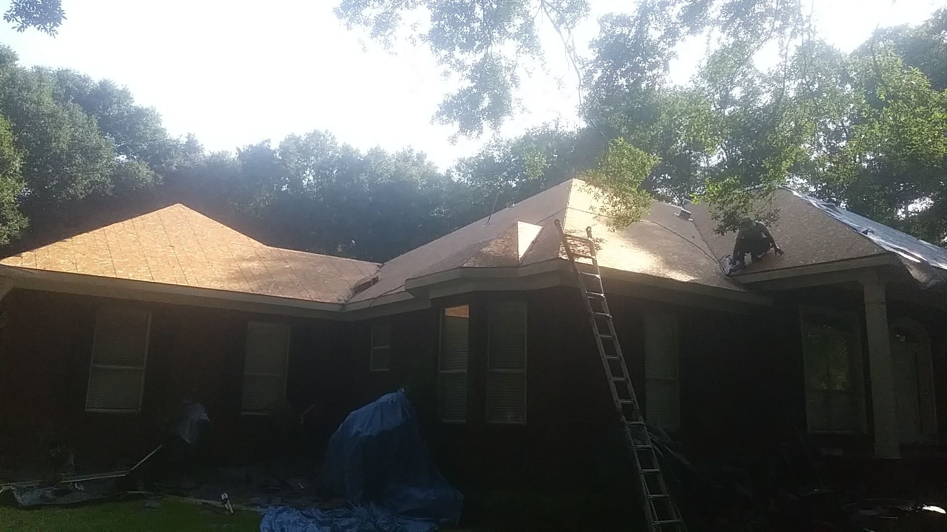 Residential Roofing Installation using Metal roofing by American Roofing & Construction LLC