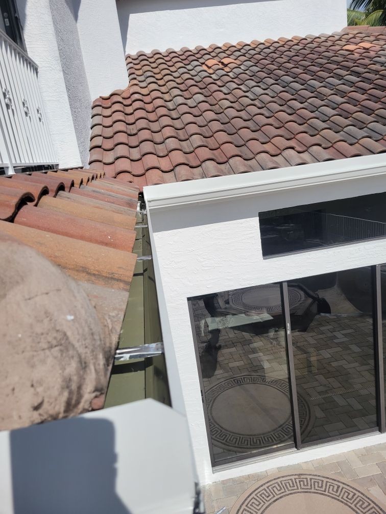 Custom Downspouts with Splash Guards in Sarasota FL by Gutter Professors