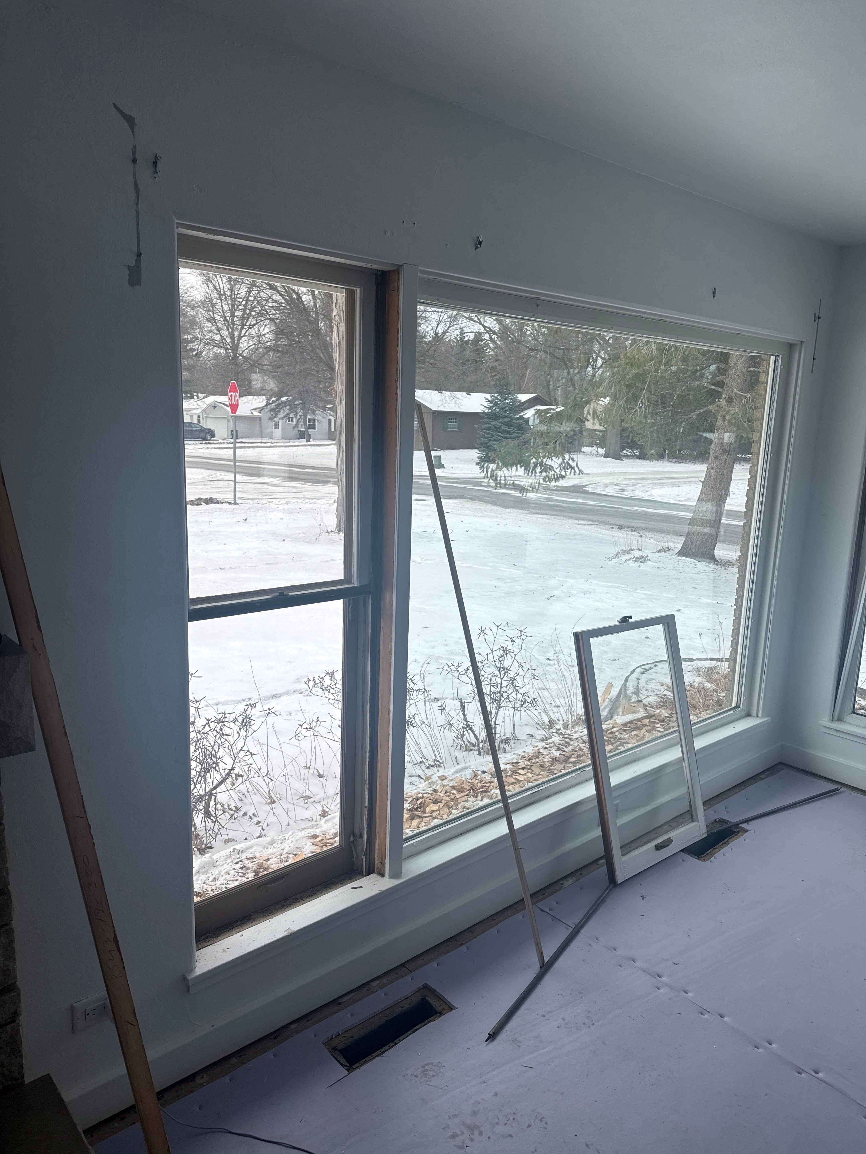 Black-Frame Pella Lifestyle Upgrade on a Partial Brick Home by United Windows and Siding LLC