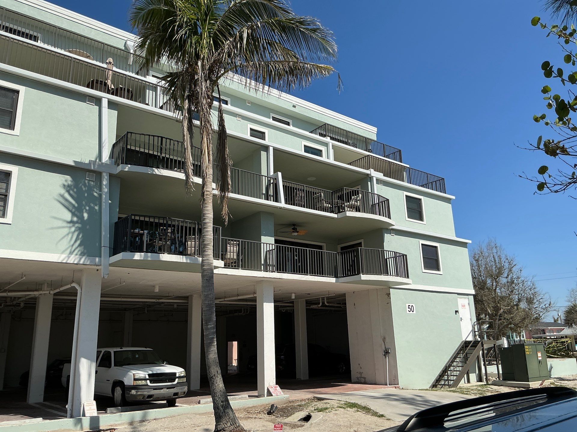 Downspout Elbow Installation in Englewood FL by Gutter Professors