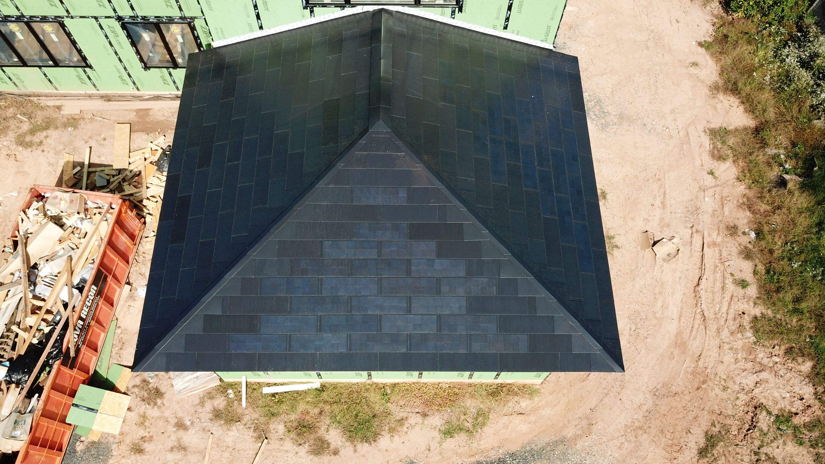 Tesla Solar Roof  using Tesla Solar Roof V3 tiles by American Home Contractors