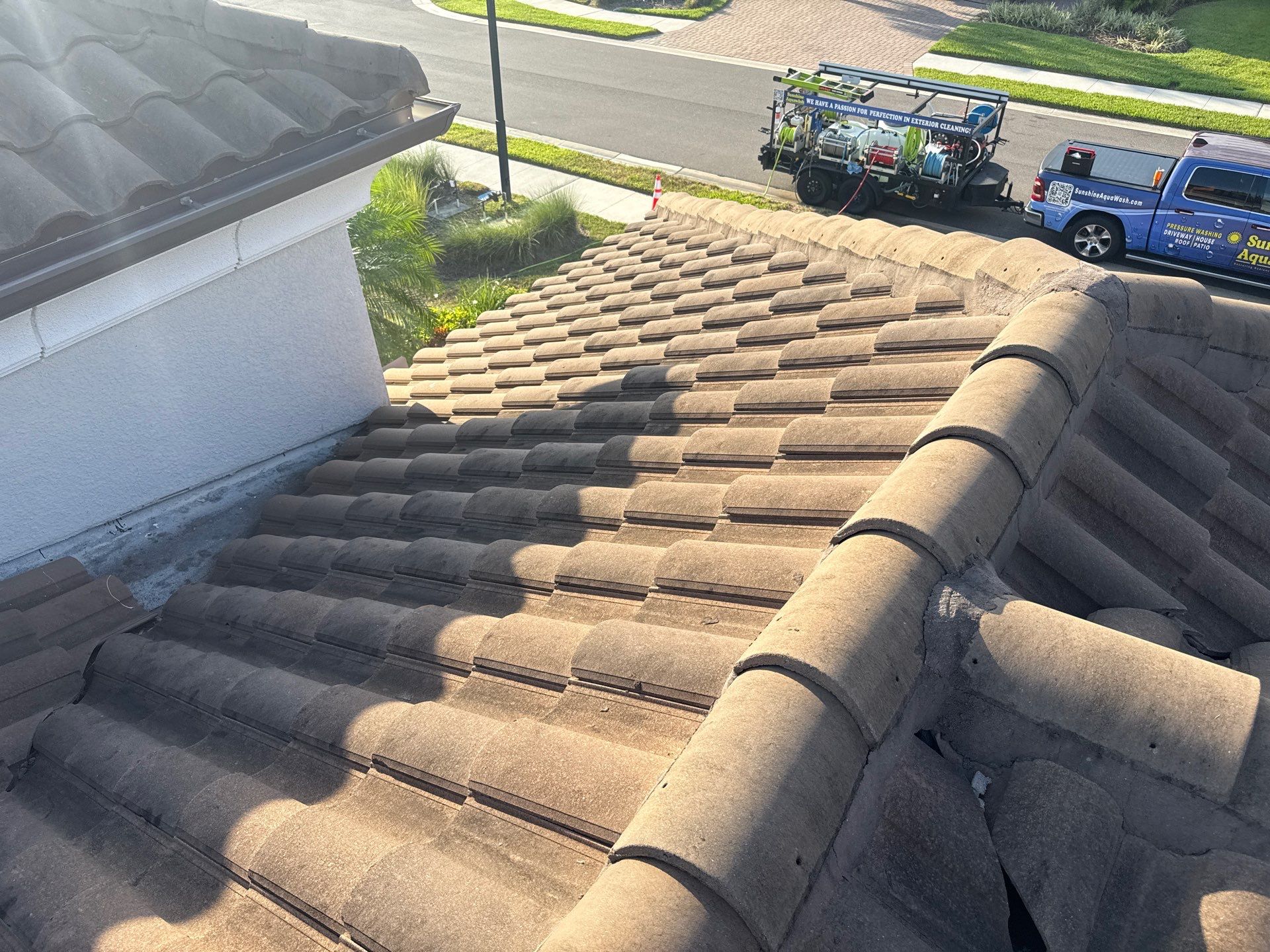 Soft Wash Roof Cleaning – Concrete Tile Roof | Artisan Lakes Esplanade, Palmetto, FL by Sunshine AquaWash