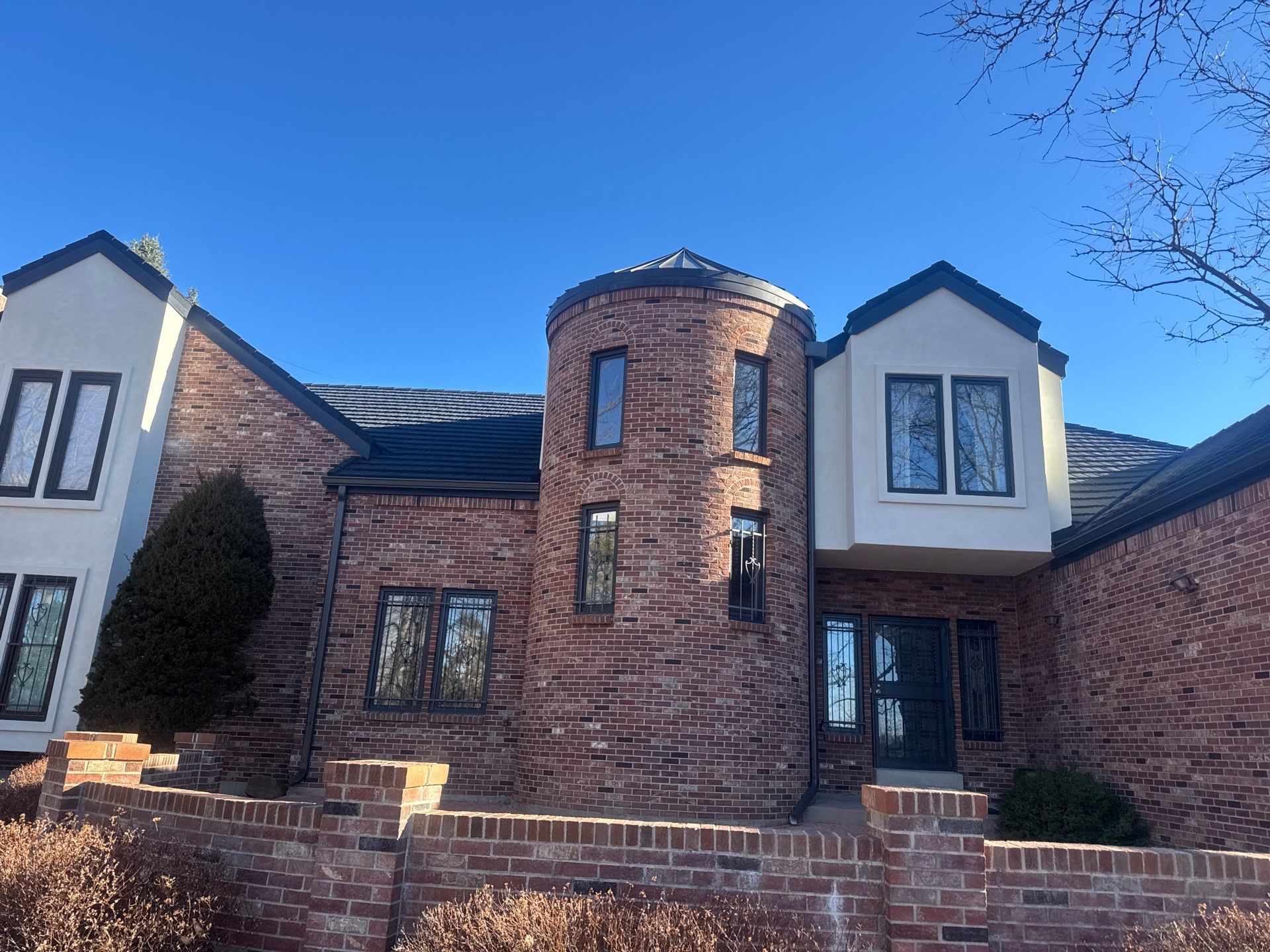 Unified Stone Coated Roof & Stucco Remodle by Blue Peaks Roofing LLC
