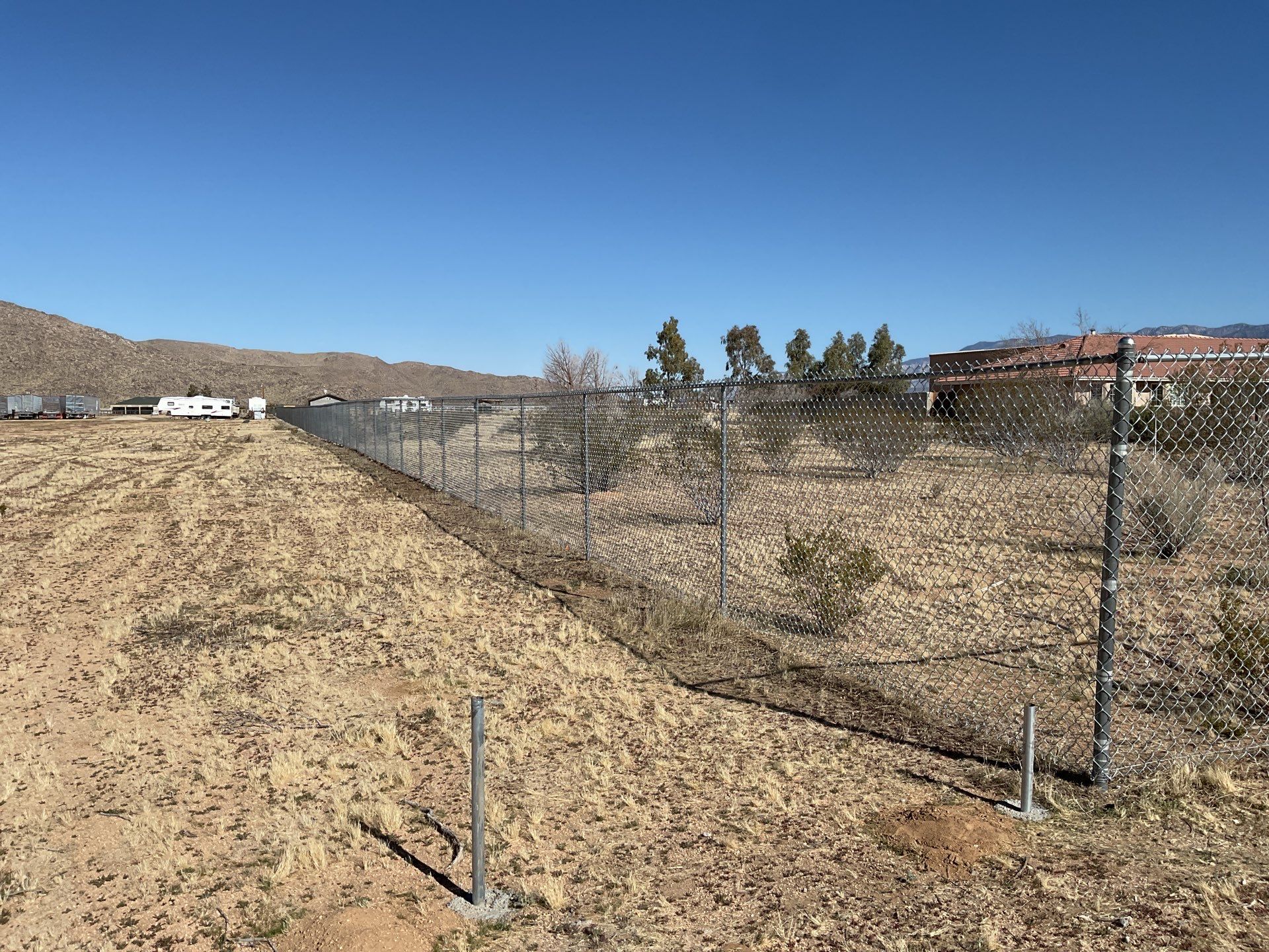 Fence Installation using chain link by Fence Guys Inc.
