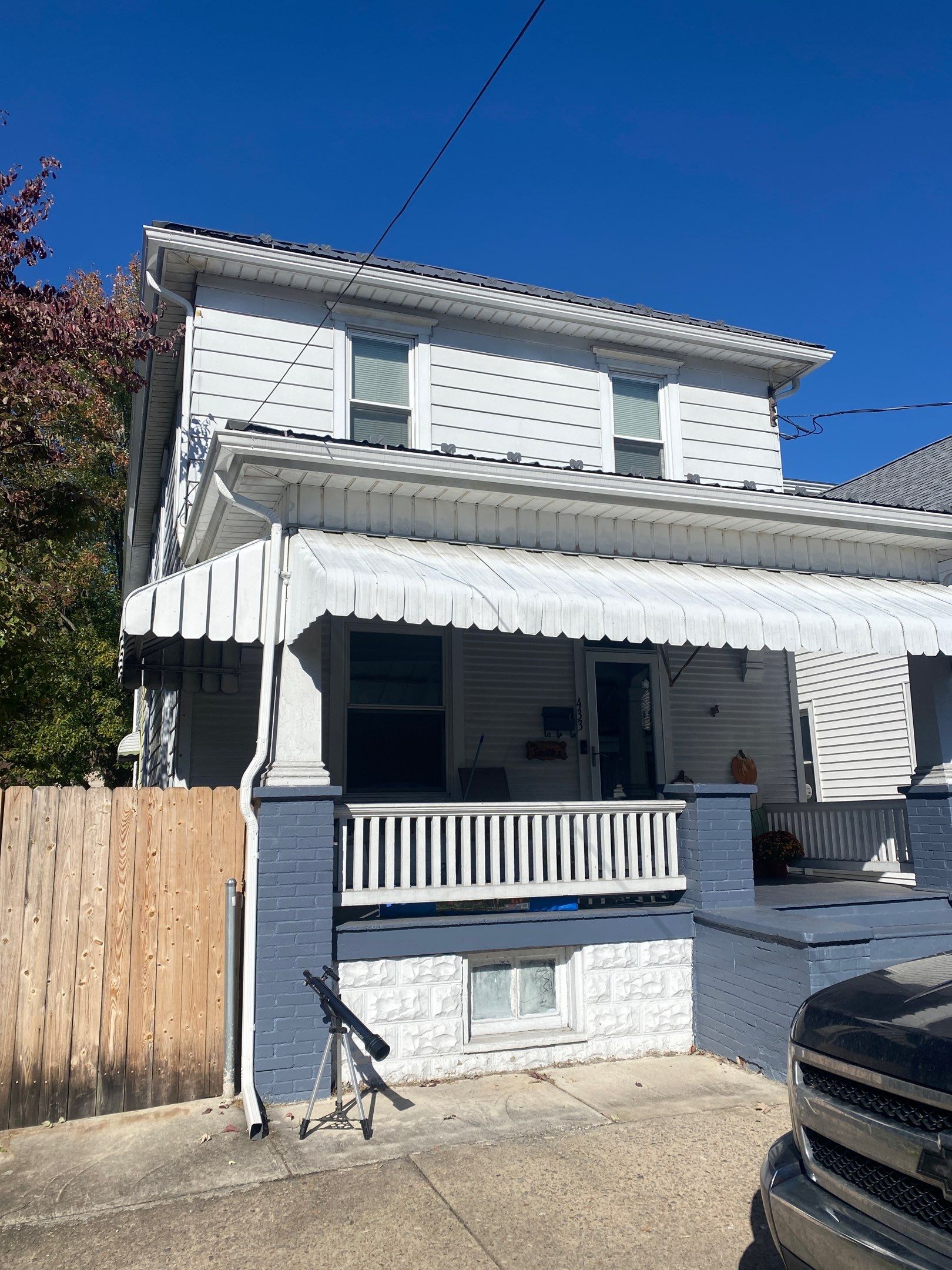 Charcoal Metal Roof & Blue Siding — A Refreshing New Look by Esh Builders