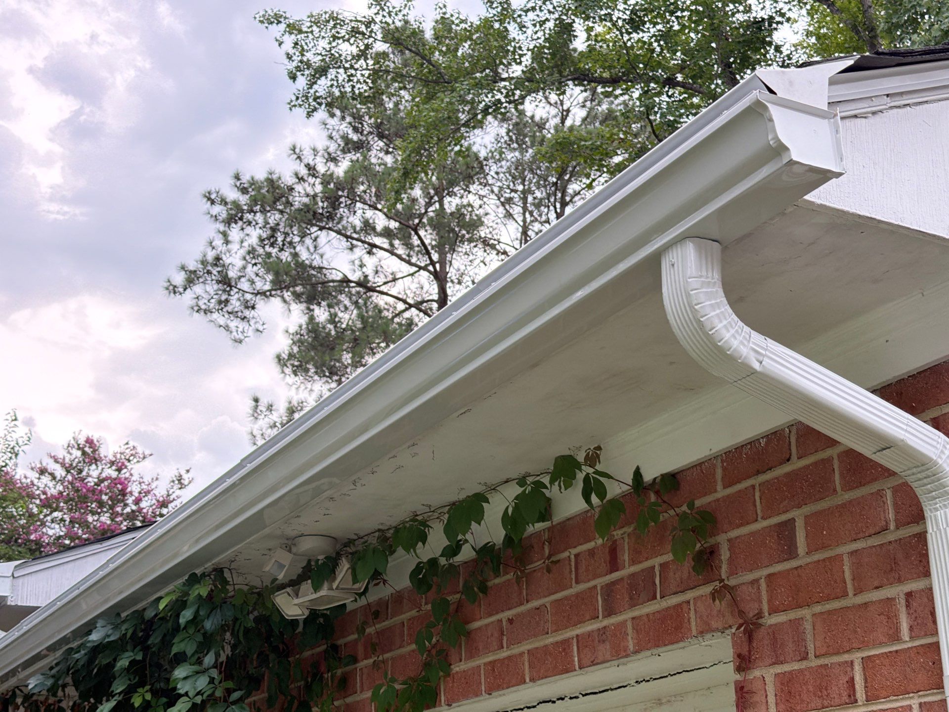 Asphalt Shingle Roof Replacement and Gutter Installation in Richmond by Cade Construction