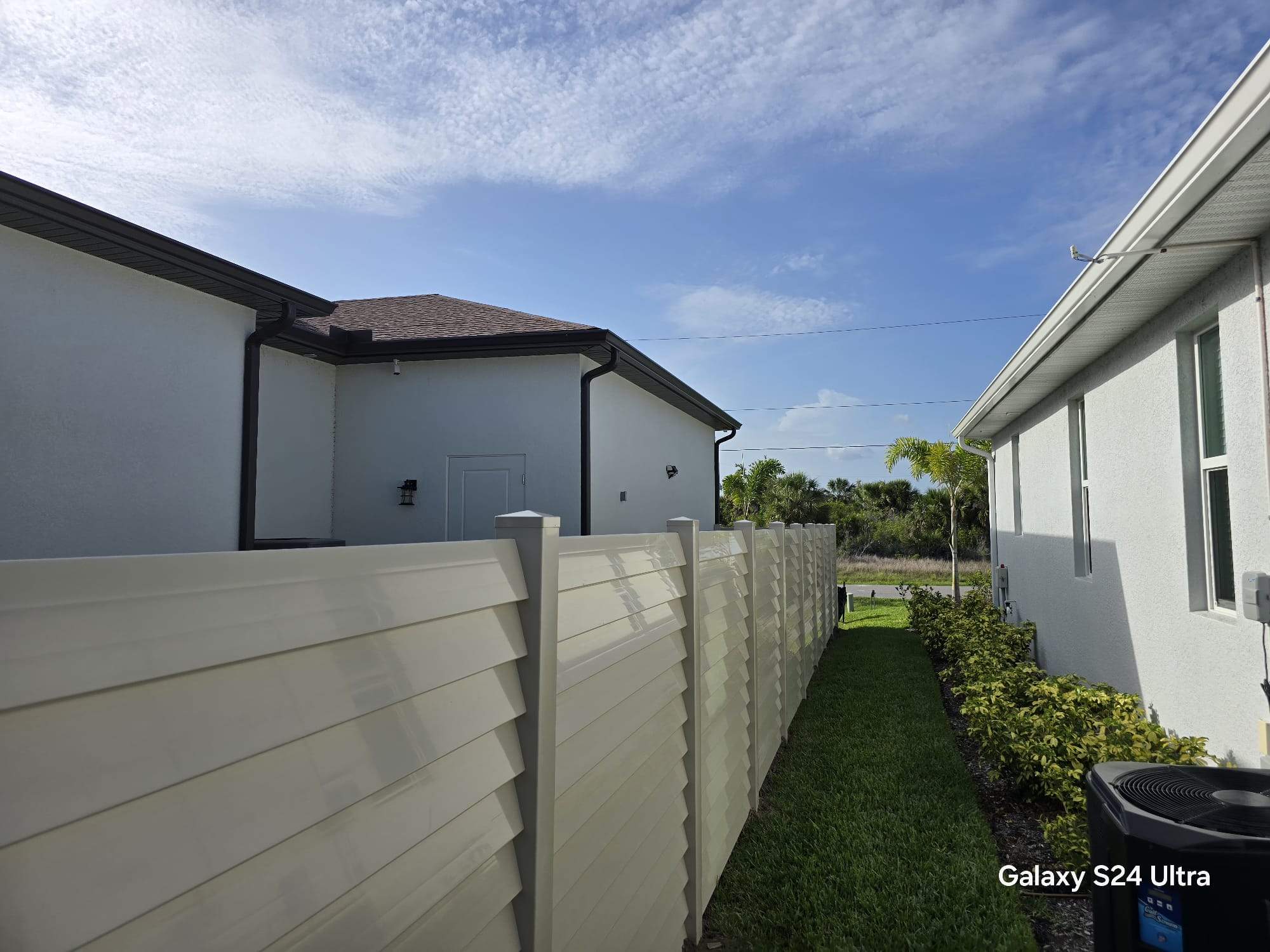 Tan Louvered Vinyl in Port Charlotte by True Fence LLC