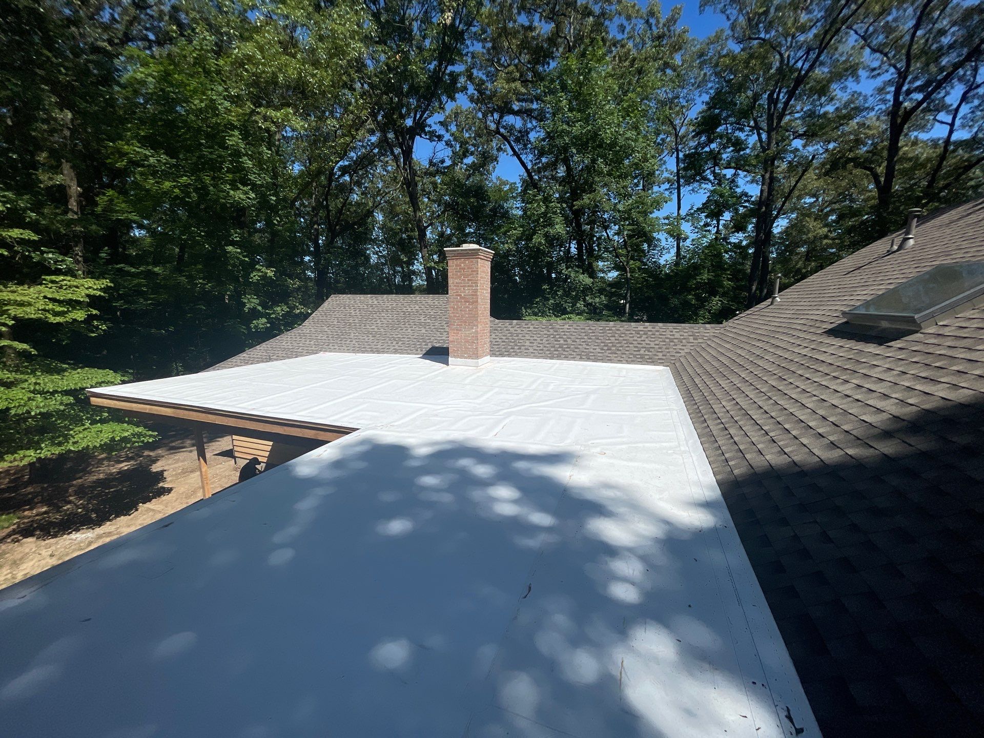 Residential Roof Replacement and Flat Roof Membrane in Memphis by Revival Roofing Services