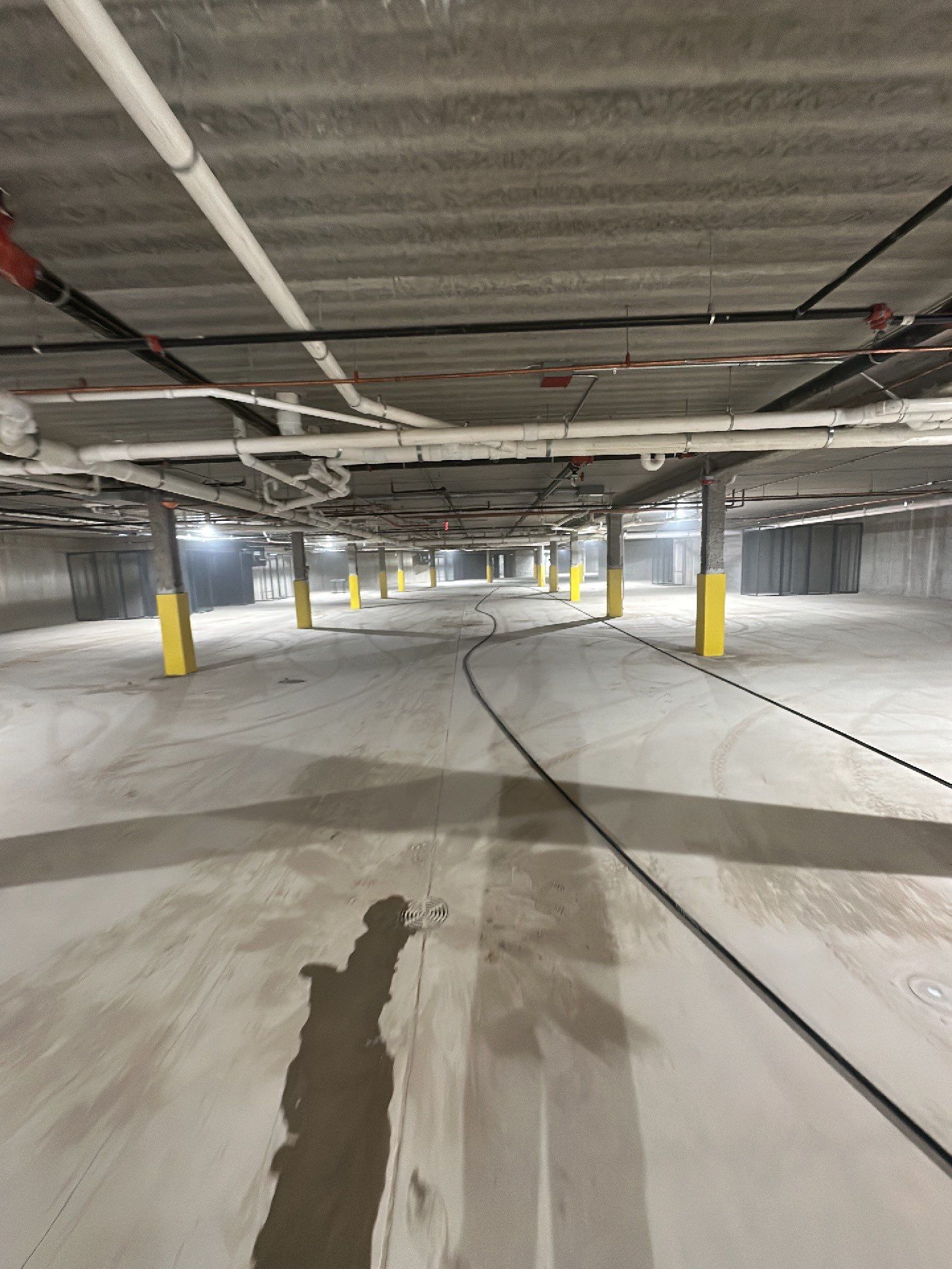 Parking garage post construction cleanup by Northern Power Washing LLC.