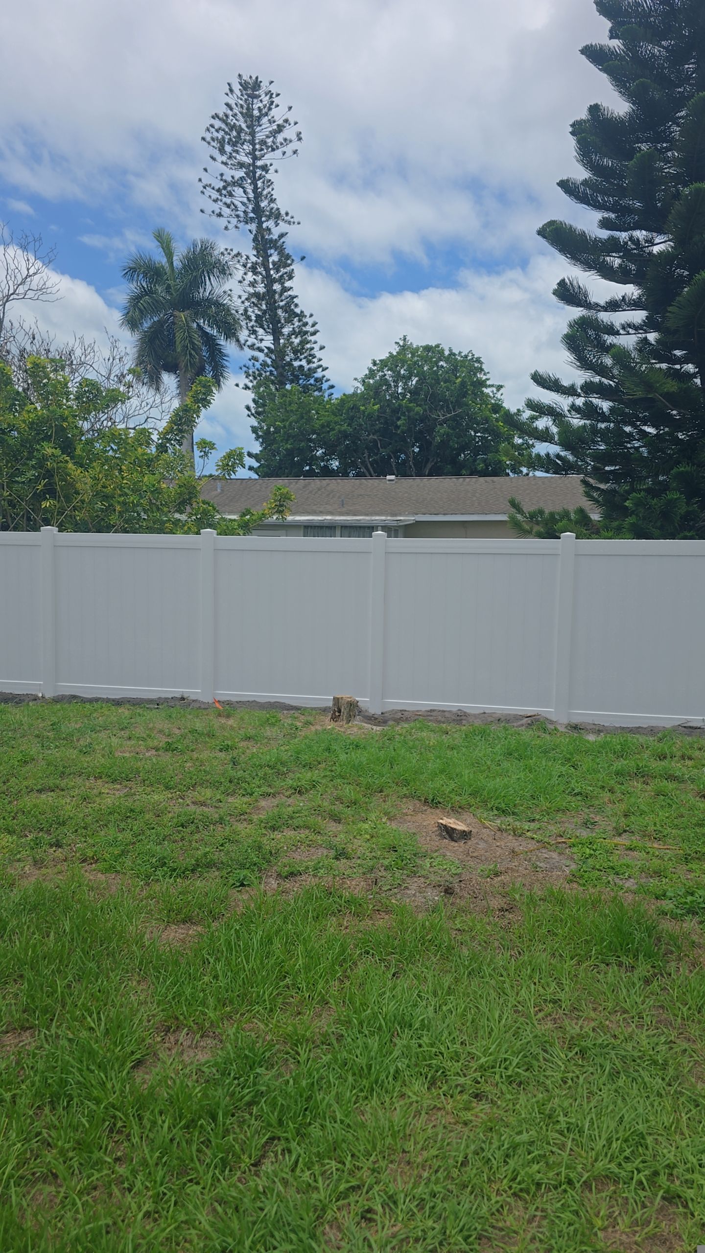 White Vinyl Privacy Fence Installation in Bonita Springs by True Fence LLC
