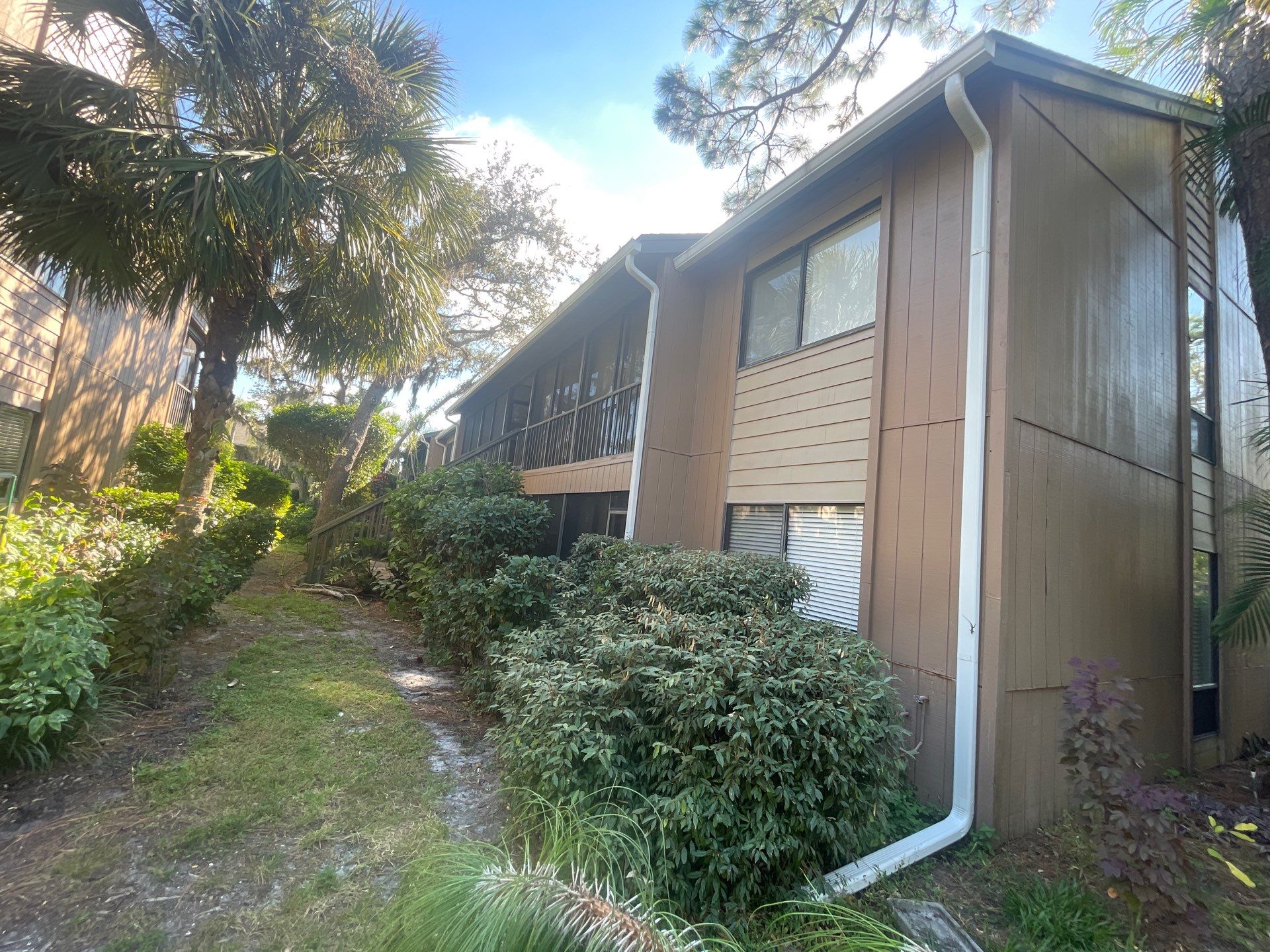 Clean Gutters and Roof in Sarasota FL by Gutter Professors