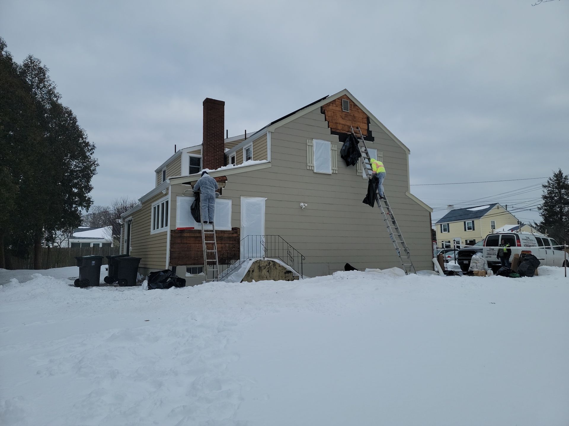 James Hardie siding, new metal roof and couple windows being installed. by UBrothers Construction